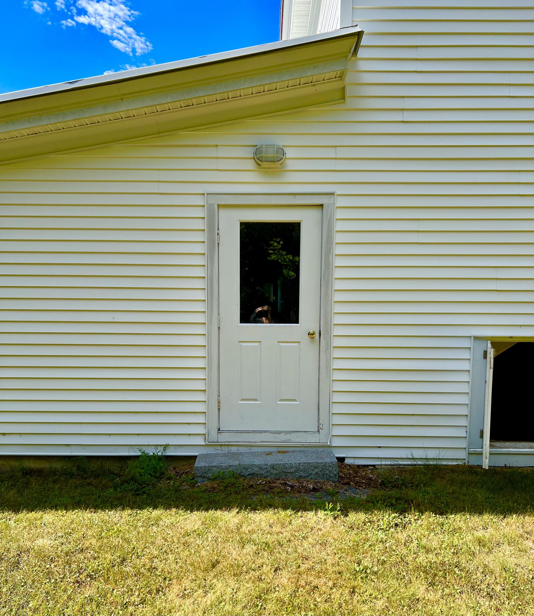 658 Tremont Road Tremont, ME 04612 - Photo 6 of 42 Left side door to lower level