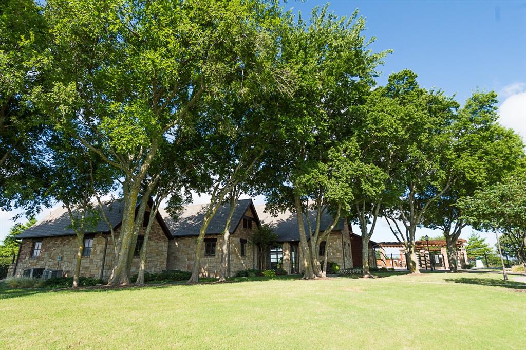 969 Canterbury Lane Forney, TX 75126 - Photo 23 of 24 a front view of a house with a yard
