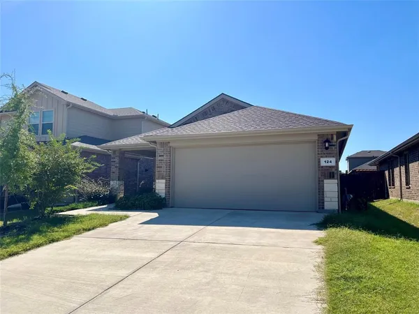 a bathroom with a tub sink and shower