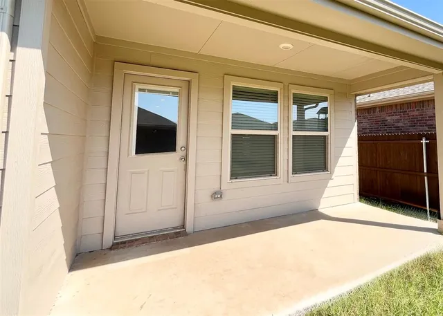 a view of swimming pool with a yard
