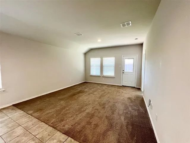 an empty room with window