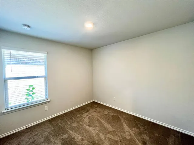 a bathroom with a sink a mirror toilet and bathtub