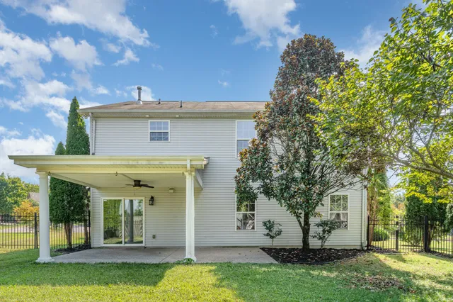 a view of a house with a swimming pool