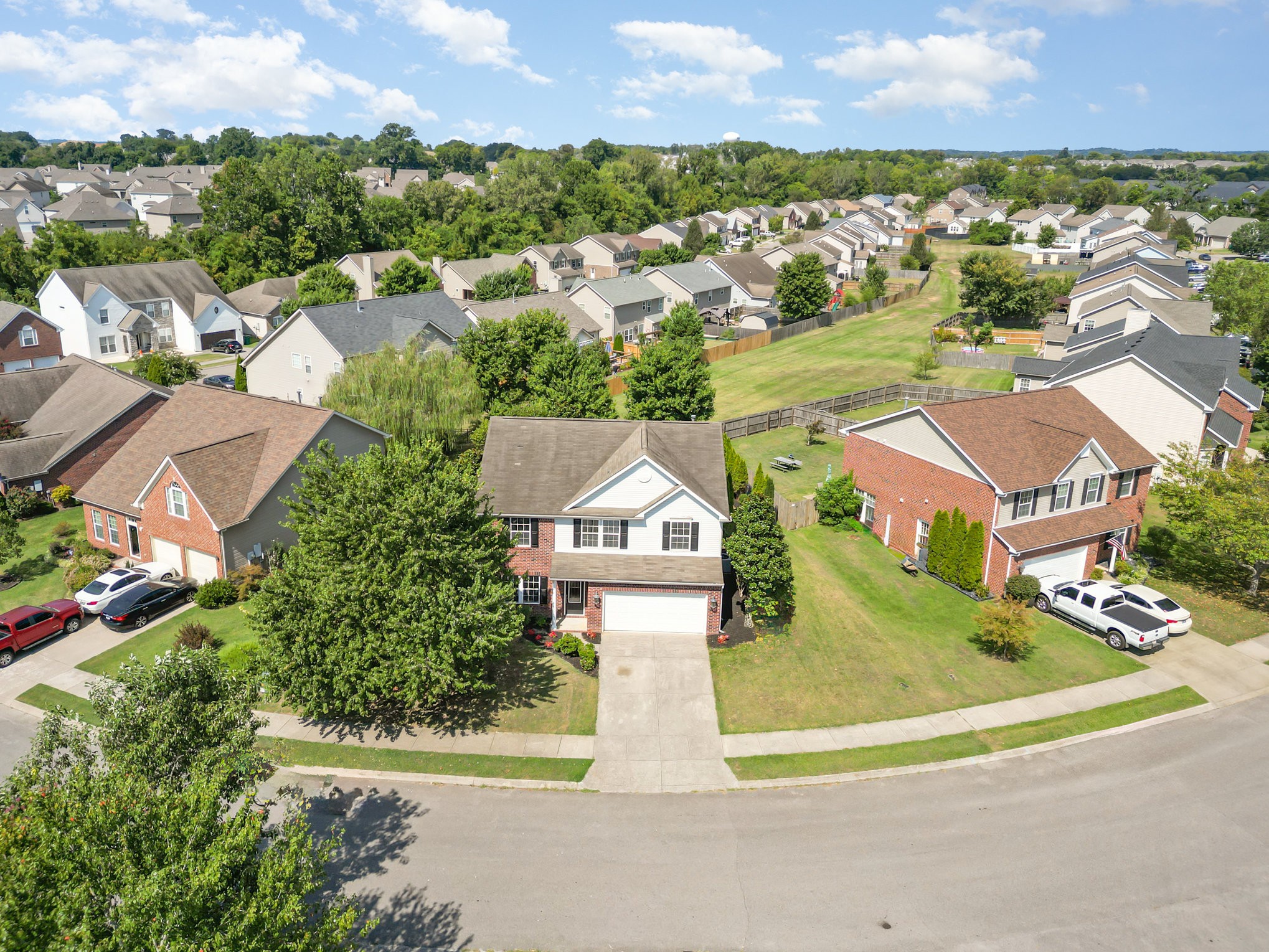 2005 Silverton Circle Spring Hill, TN 37174 - Photo 29 of 34 an aerial view of residential houses with outdoor space and parking