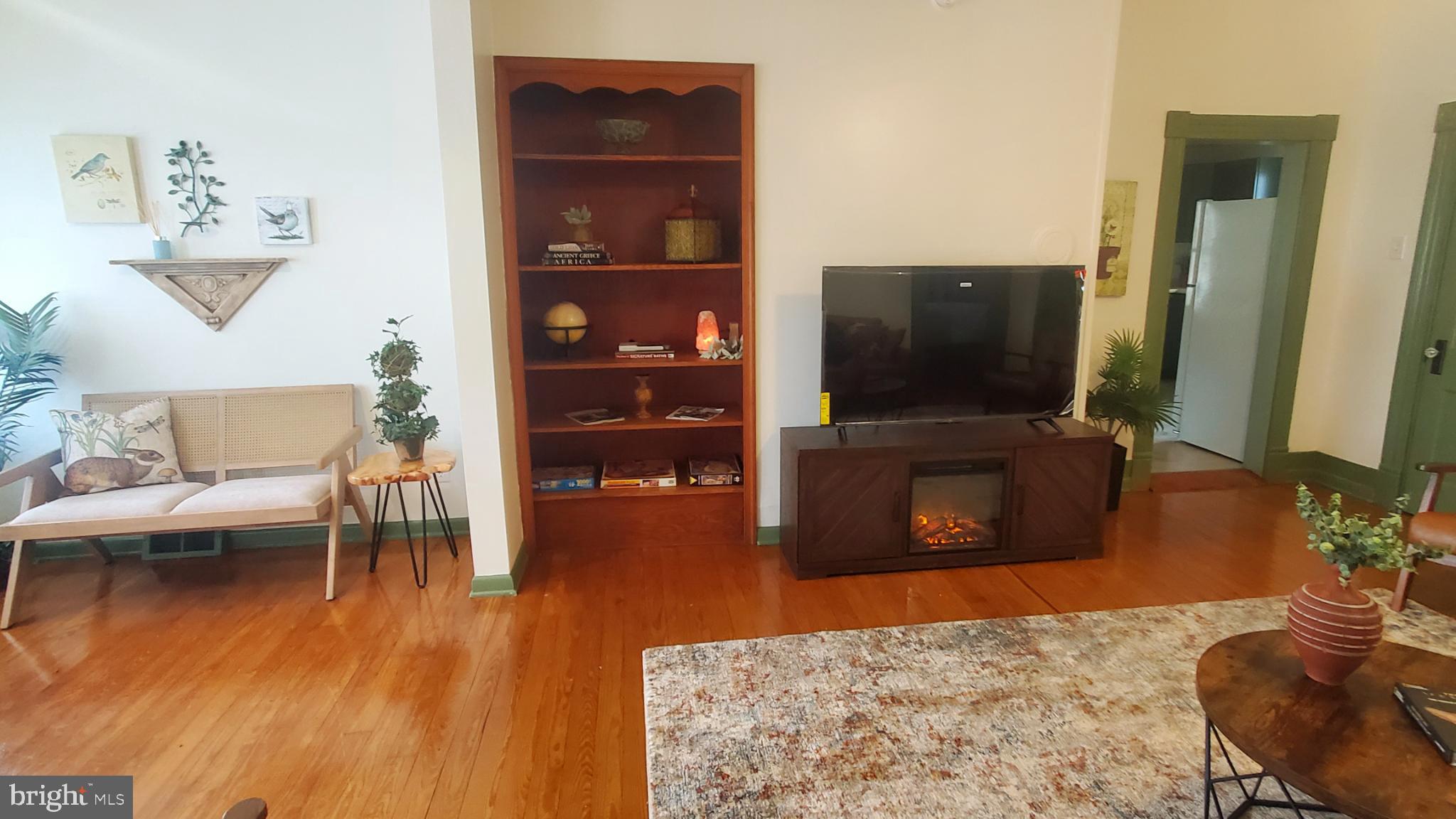 Charming living space with warm wood accents.