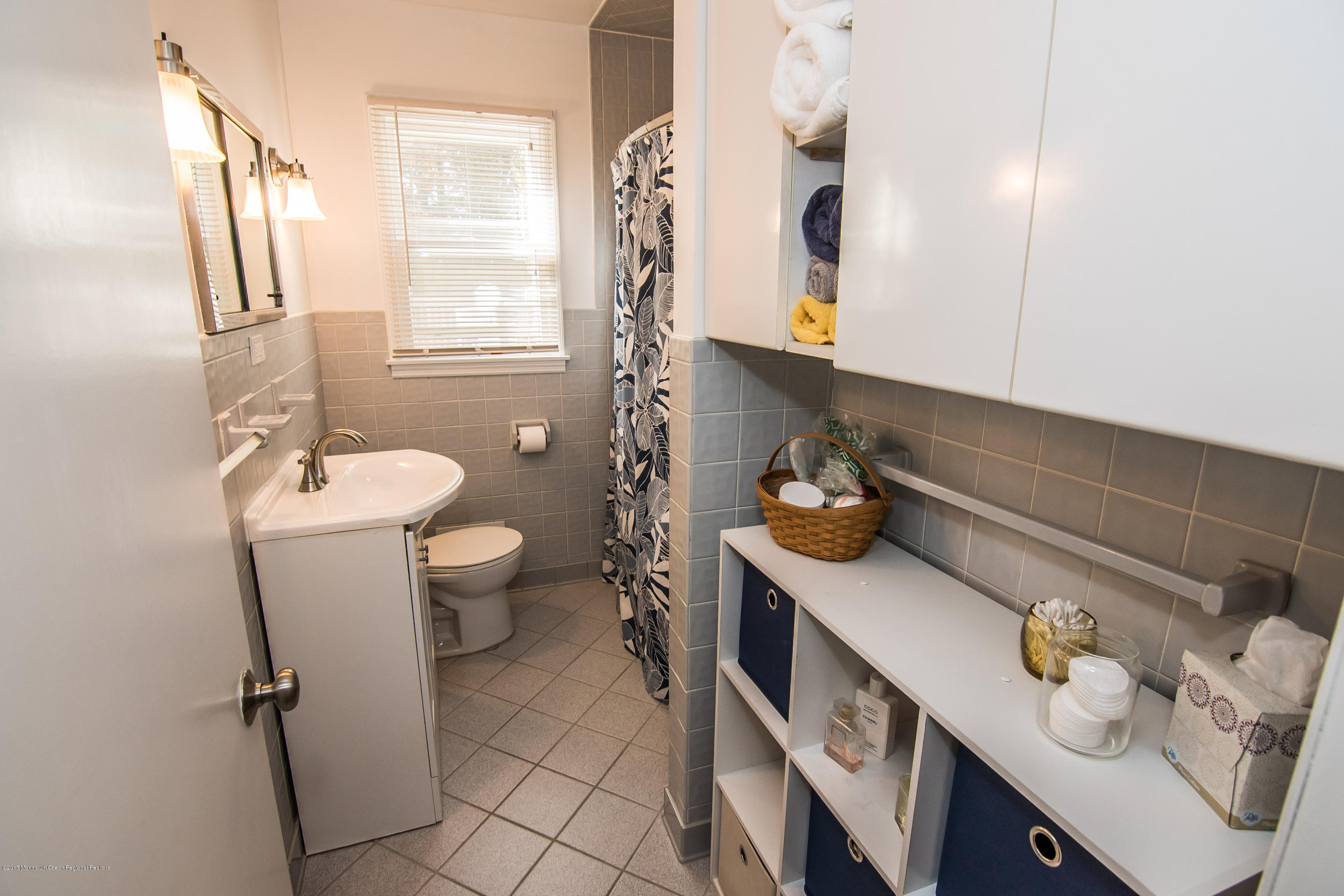 20 Hope Chapel Road Jackson, NJ 08527 - Photo 15 of 38 a bathroom with a sink a toilet and mirror