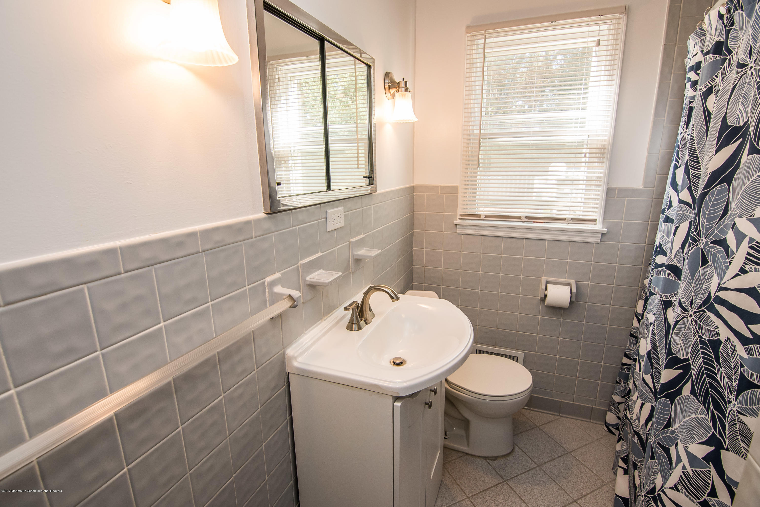 20 Hope Chapel Road Jackson, NJ 08527 - Photo 16 of 38 a bathroom with a toilet sink and mirror