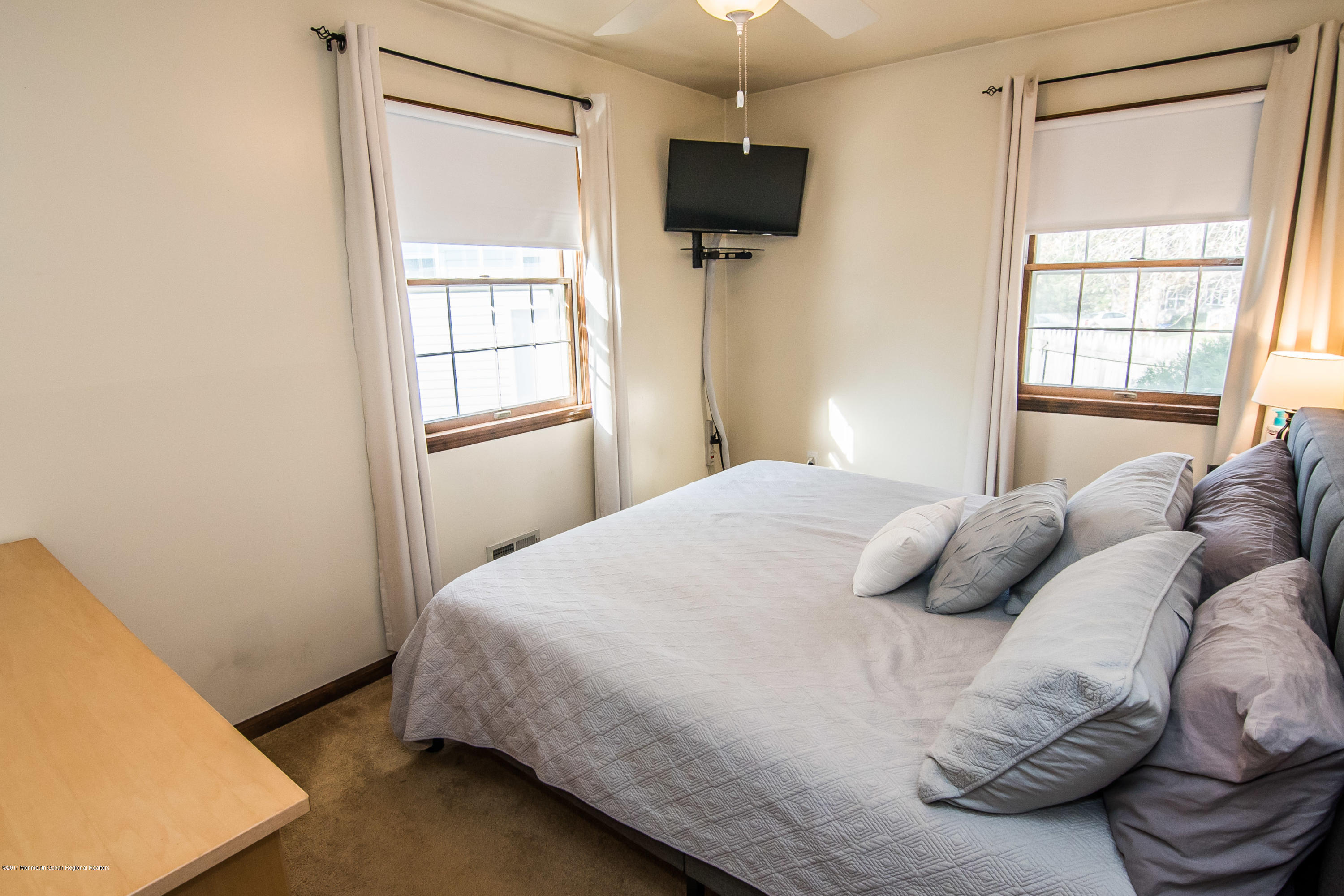 20 Hope Chapel Road Jackson, NJ 08527 - Photo 17 of 38 a bedroom with a bed and a flat tv screen
