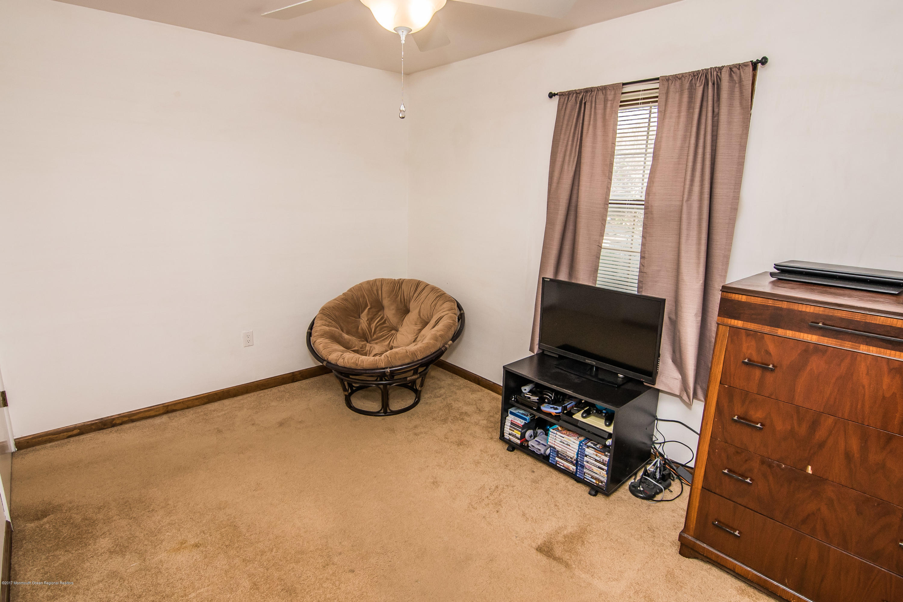 20 Hope Chapel Road Jackson, NJ 08527 - Photo 20 of 38 a view of a livingroom with furniture and a flat screen tv