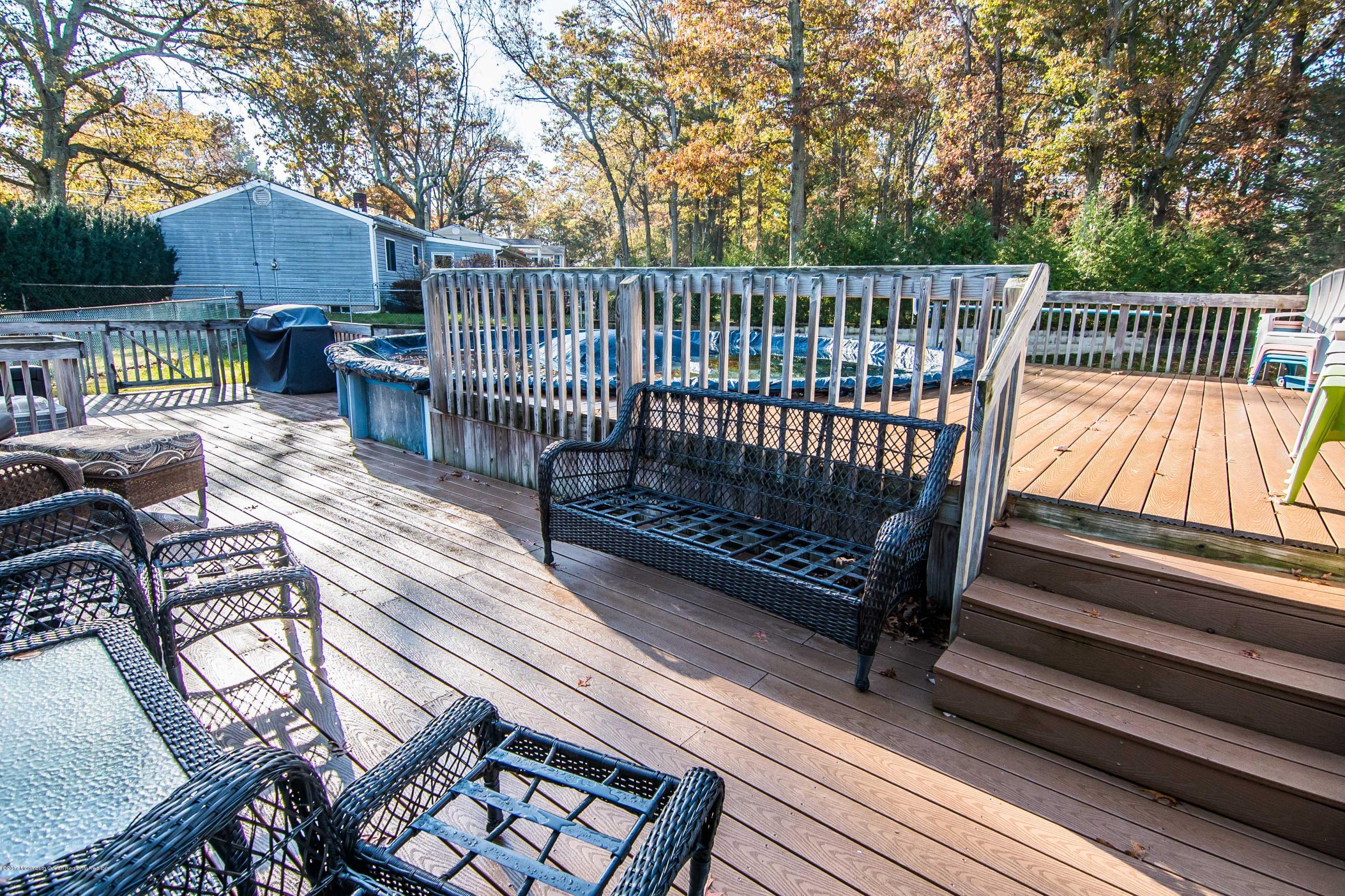 20 Hope Chapel Road Jackson, NJ 08527 - Photo 29 of 38 a view of balcony with wooden floor and outdoor seating