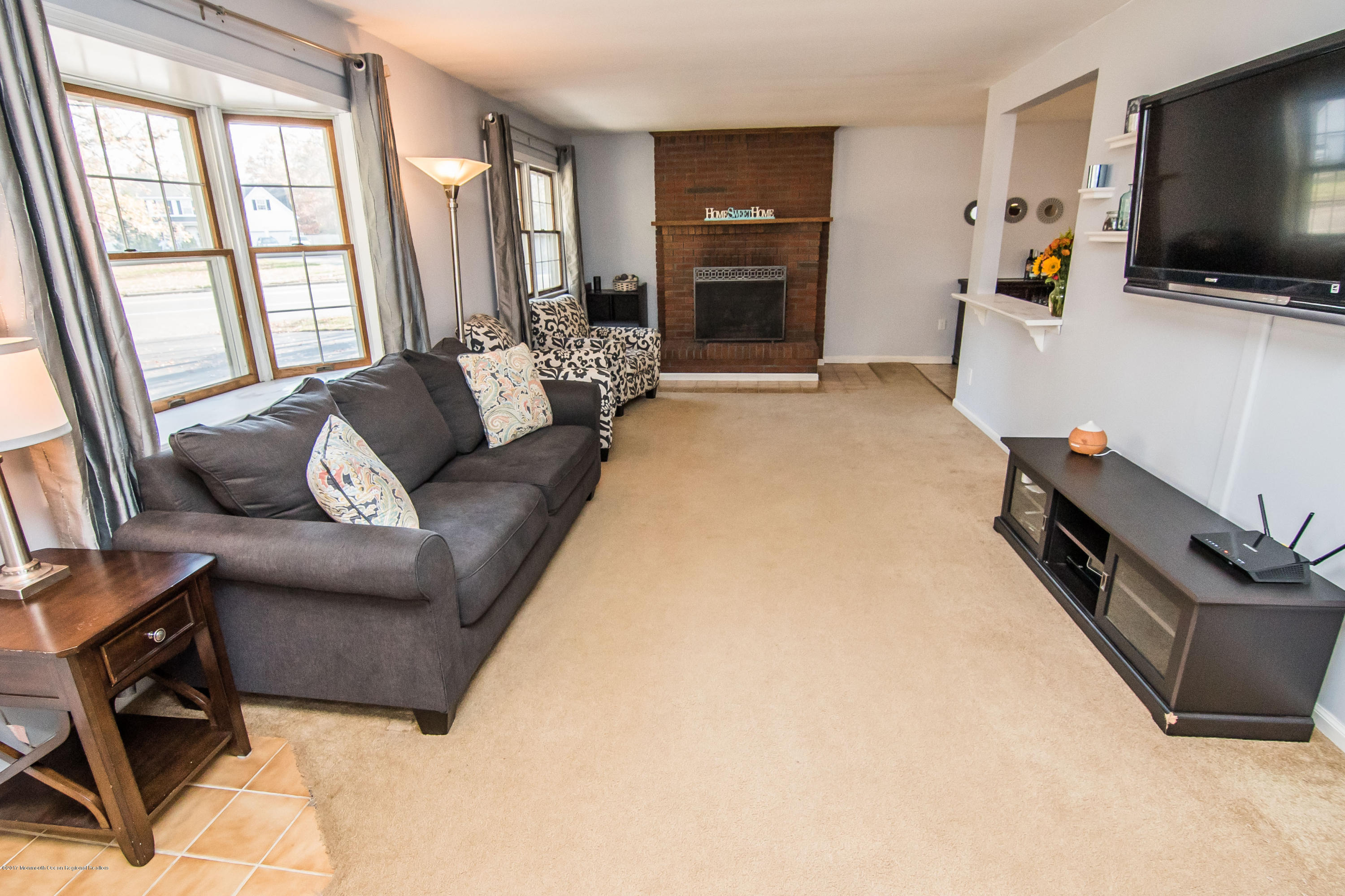 20 Hope Chapel Road Jackson, NJ 08527 - Photo 3 of 38 a living room with furniture and a flat screen tv