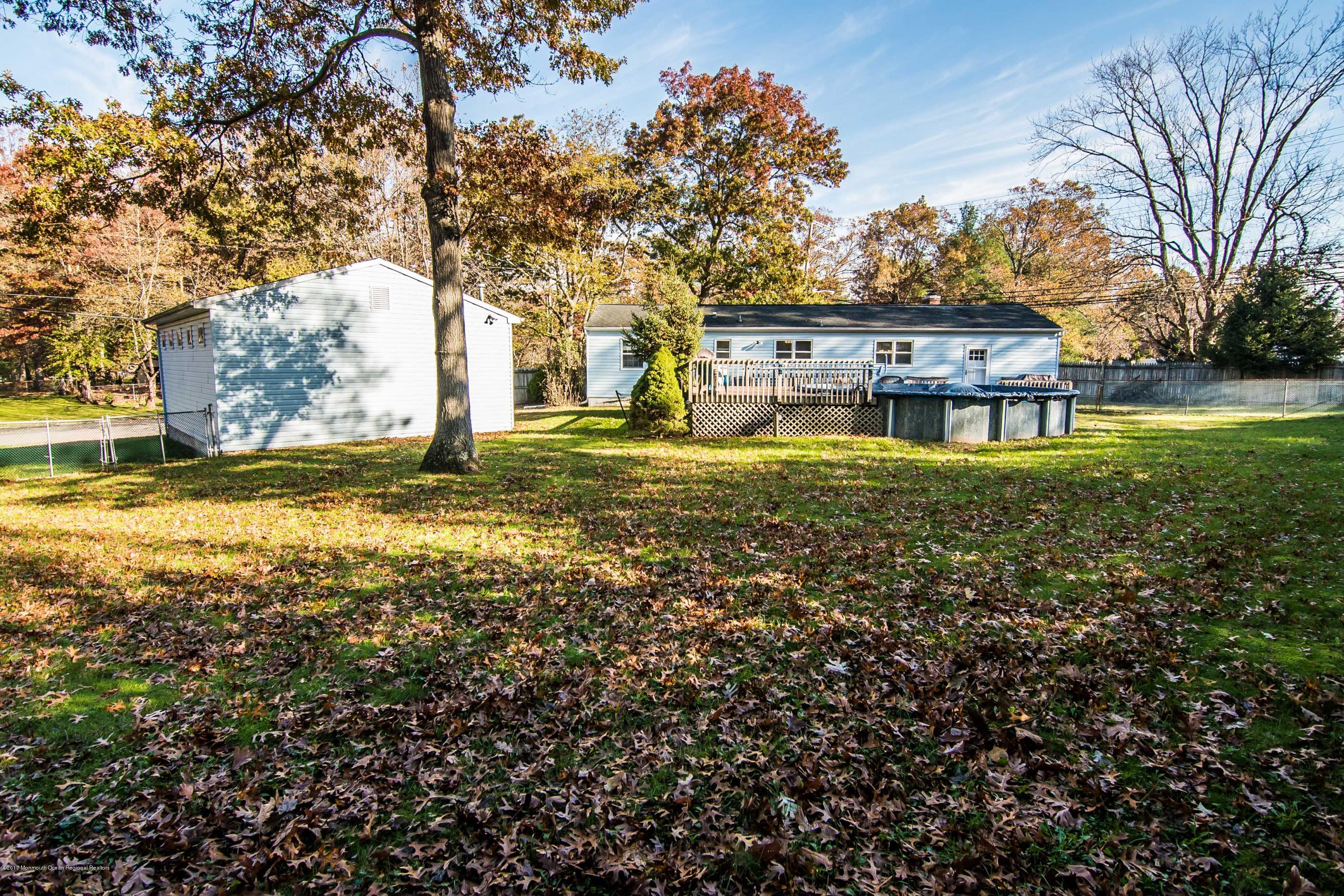 20 Hope Chapel Road Jackson, NJ 08527 - Photo 34 of 38 a view of a house with a big yard and large trees