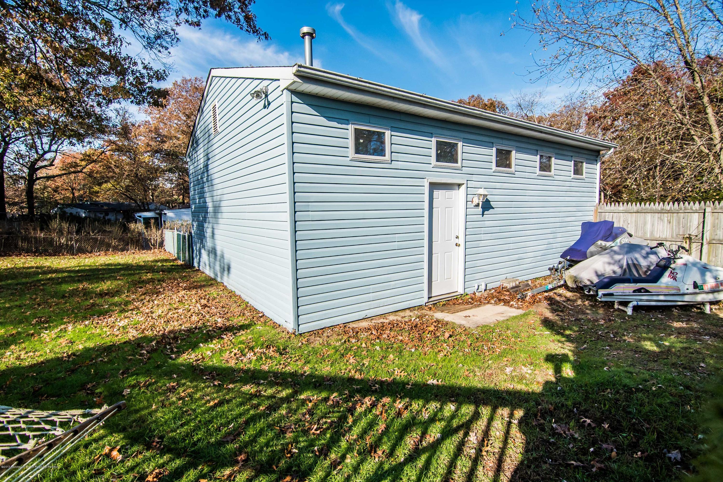 20 Hope Chapel Road Jackson, NJ 08527 - Photo 35 of 38 a view of a house with backyard and sitting area
