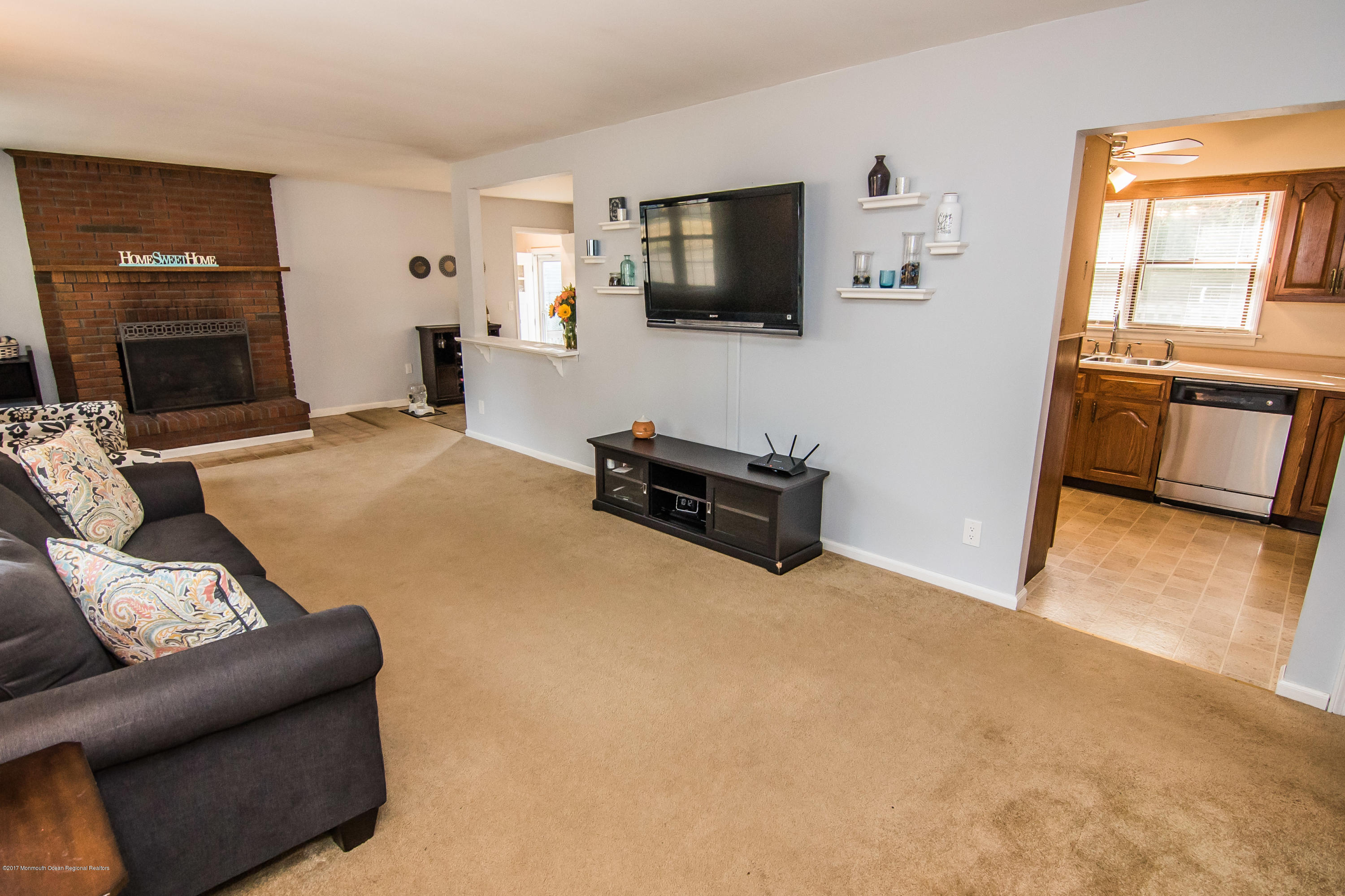 20 Hope Chapel Road Jackson, NJ 08527 - Photo 5 of 38 a living room with furniture and a flat screen tv