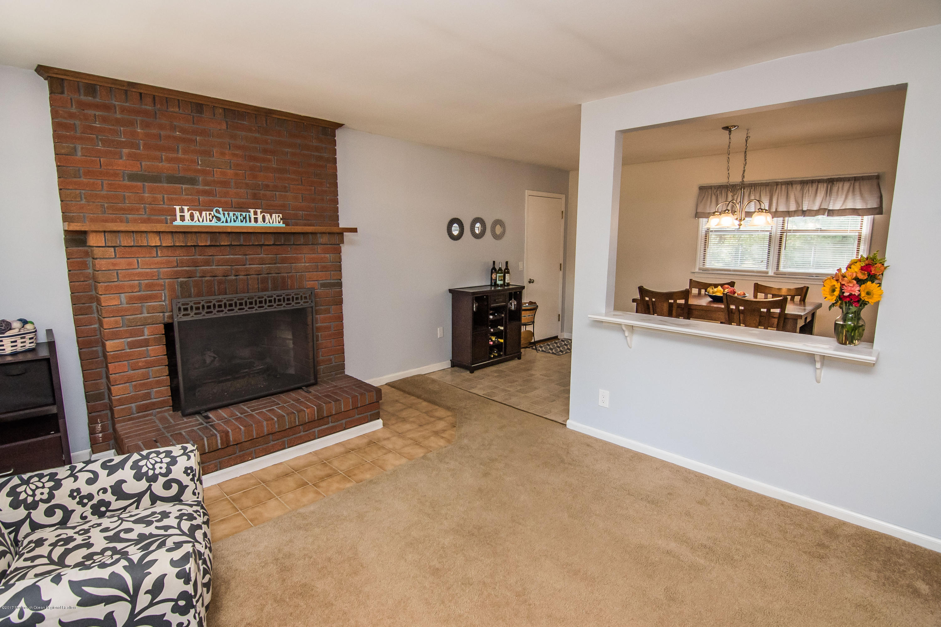 20 Hope Chapel Road Jackson, NJ 08527 - Photo 6 of 38 a living room with furniture and a fireplace