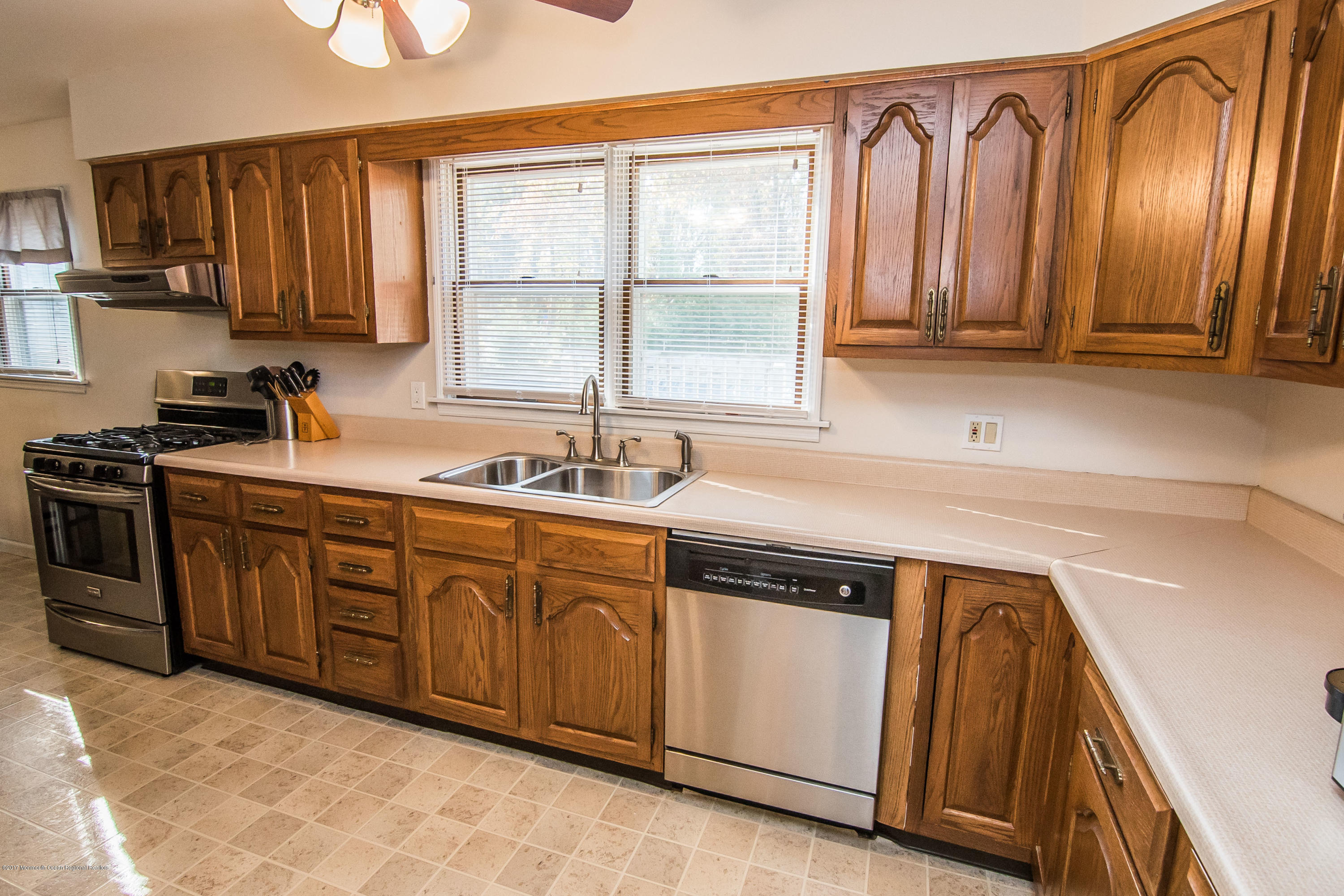20 Hope Chapel Road Jackson, NJ 08527 - Photo 9 of 38 a kitchen with stainless steel appliances granite countertop a sink a stove and a refrigerator