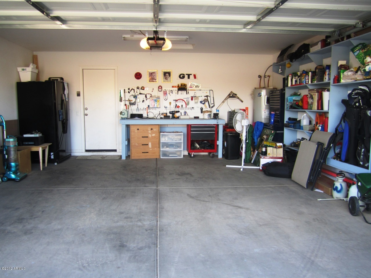 43839 West Cowpath Road Maricopa, AZ 85138 - Photo 21 of 24 Garage Shelves