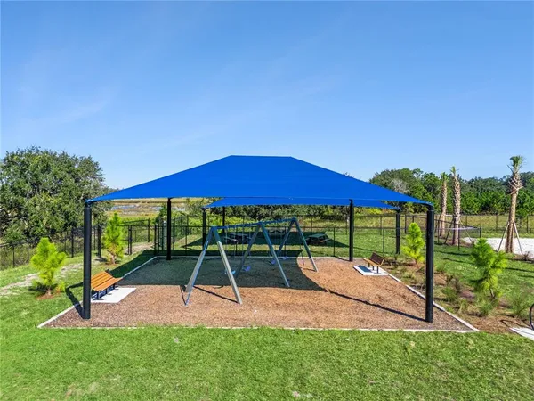 a view of a park with a slide