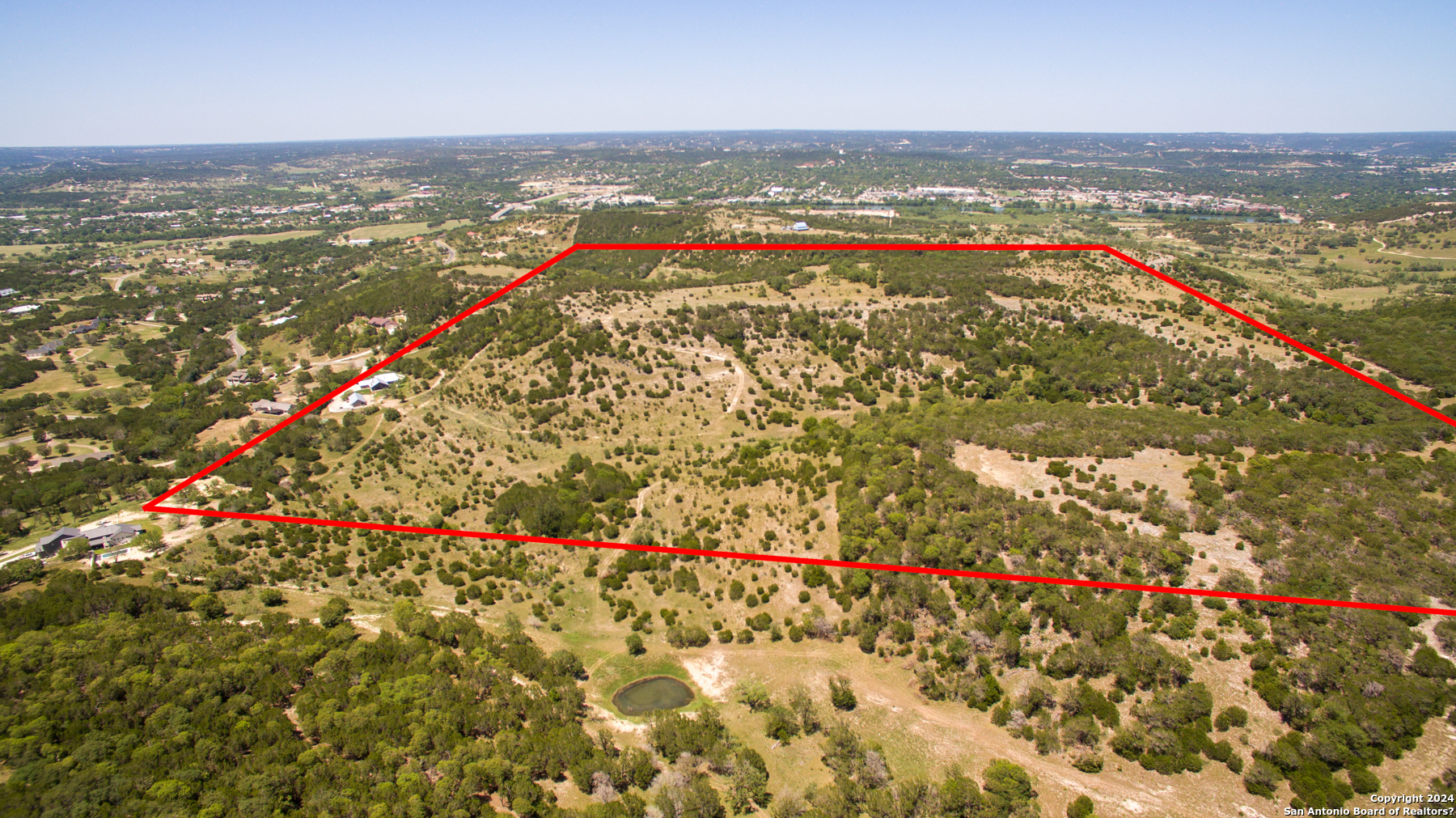 0 Sheppard Rees Road Kerrville, TX 78028 - Photo 2 of 15 an aerial view of residential building and lake