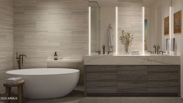 a bathroom with a bathtub and a sink