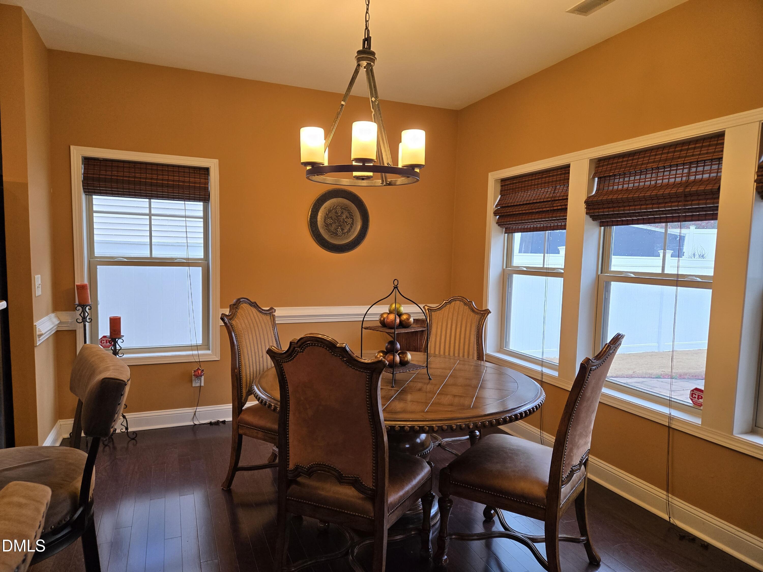 4202 Smithson Court Raleigh, NC 27616 - Photo 13 of 54 a view of a dining room with furniture and a window