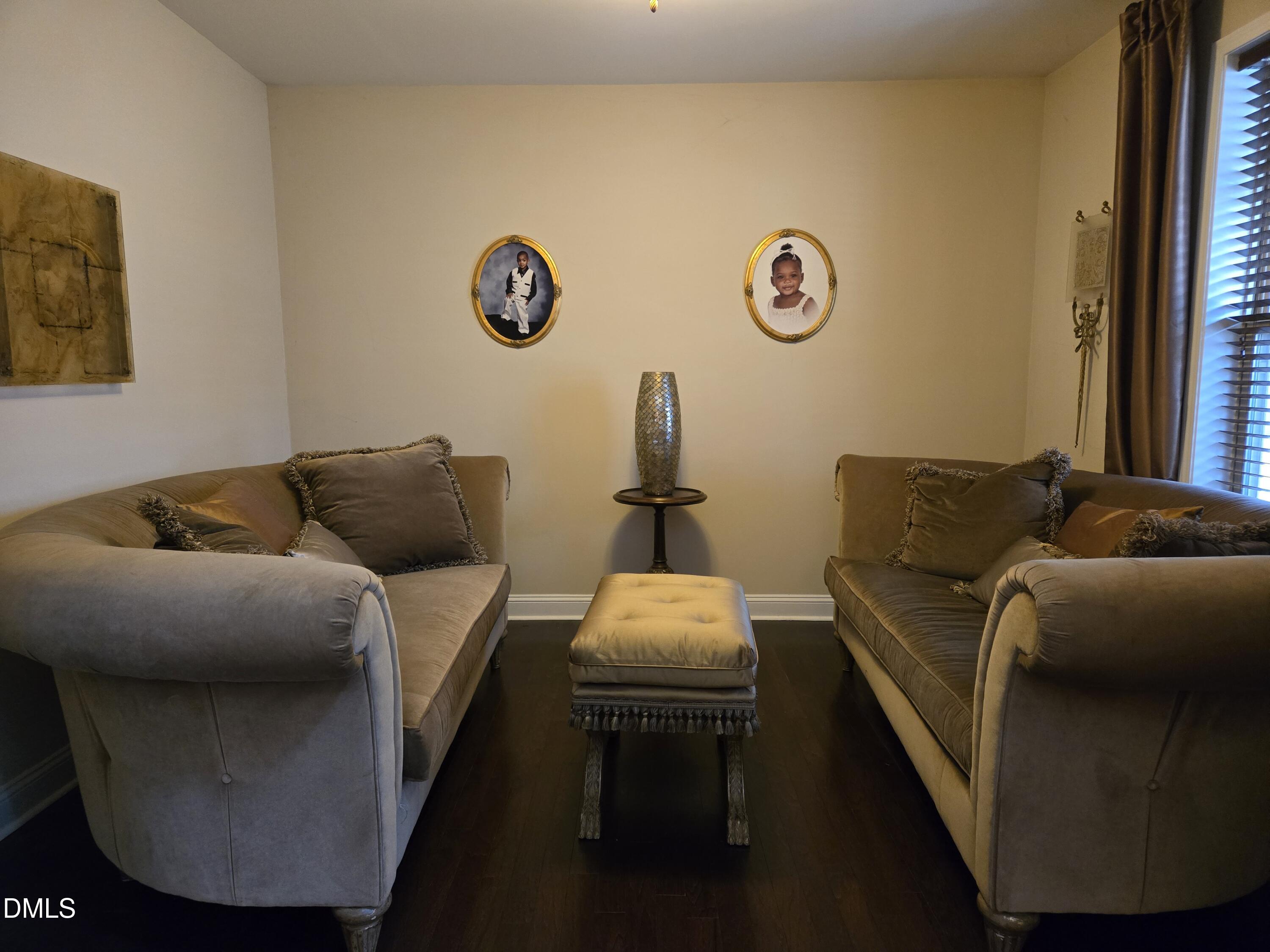 4202 Smithson Court Raleigh, NC 27616 - Photo 21 of 54 a living room with furniture and a window