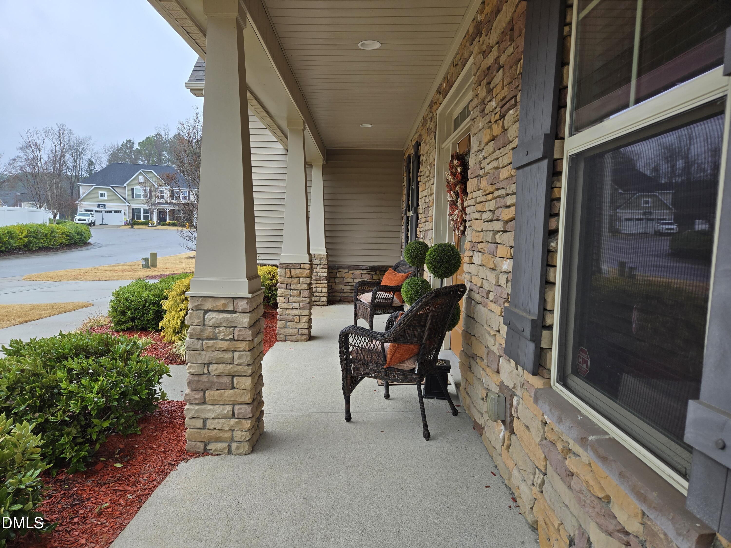 4202 Smithson Court Raleigh, NC 27616 - Photo 3 of 54 a backyard of a house with outdoor seating