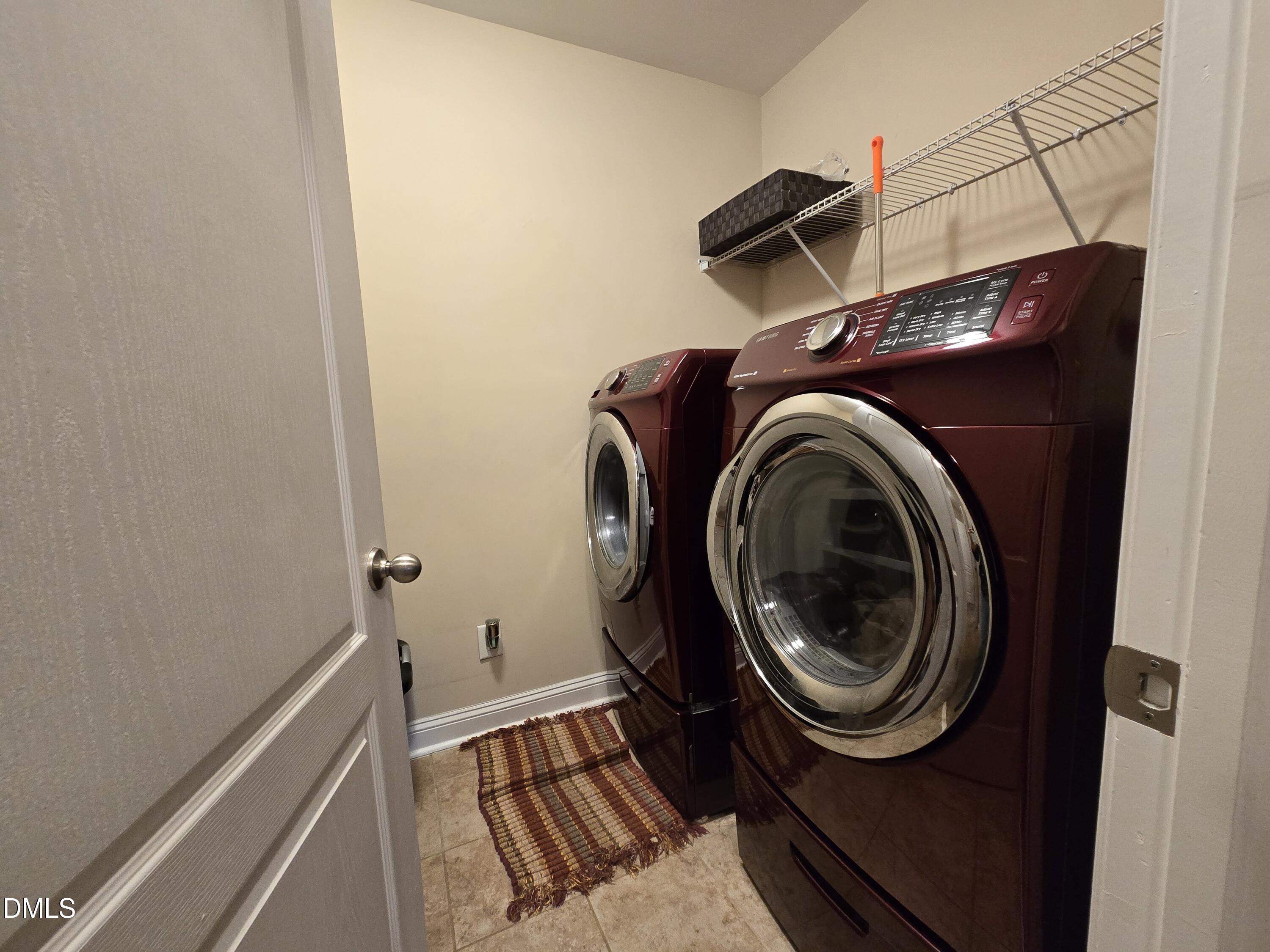 4202 Smithson Court Raleigh, NC 27616 - Photo 33 of 54 a utility room with dryer and washer