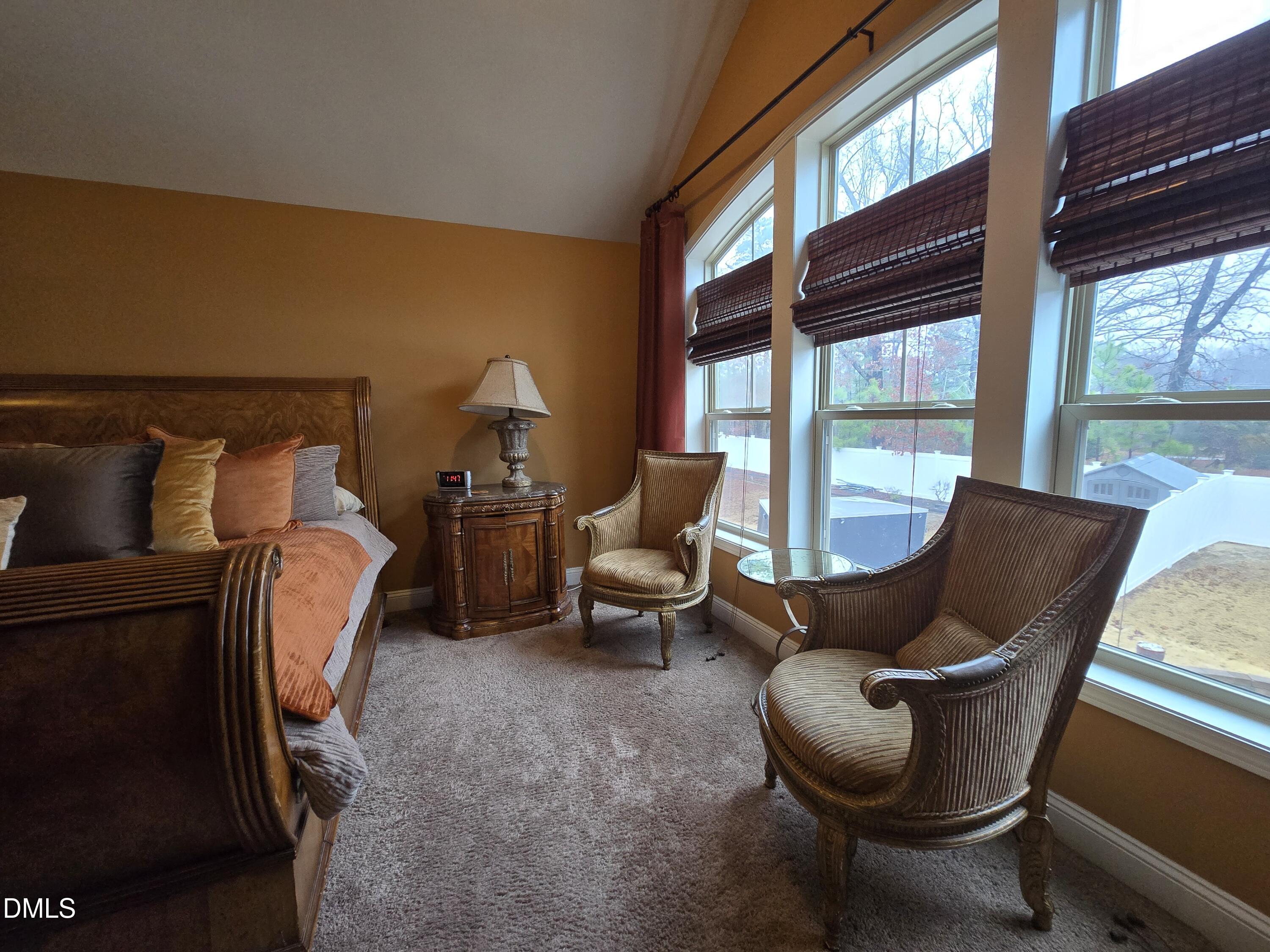 4202 Smithson Court Raleigh, NC 27616 - Photo 36 of 54 a living room with furniture and a large window