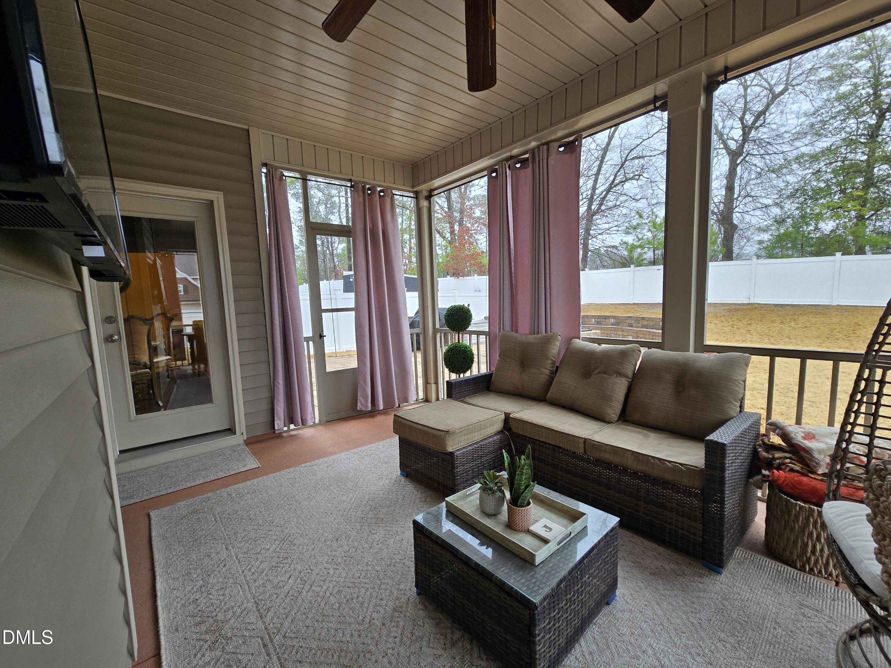 4202 Smithson Court Raleigh, NC 27616 - Photo 41 of 54 a living room with furniture and a large window
