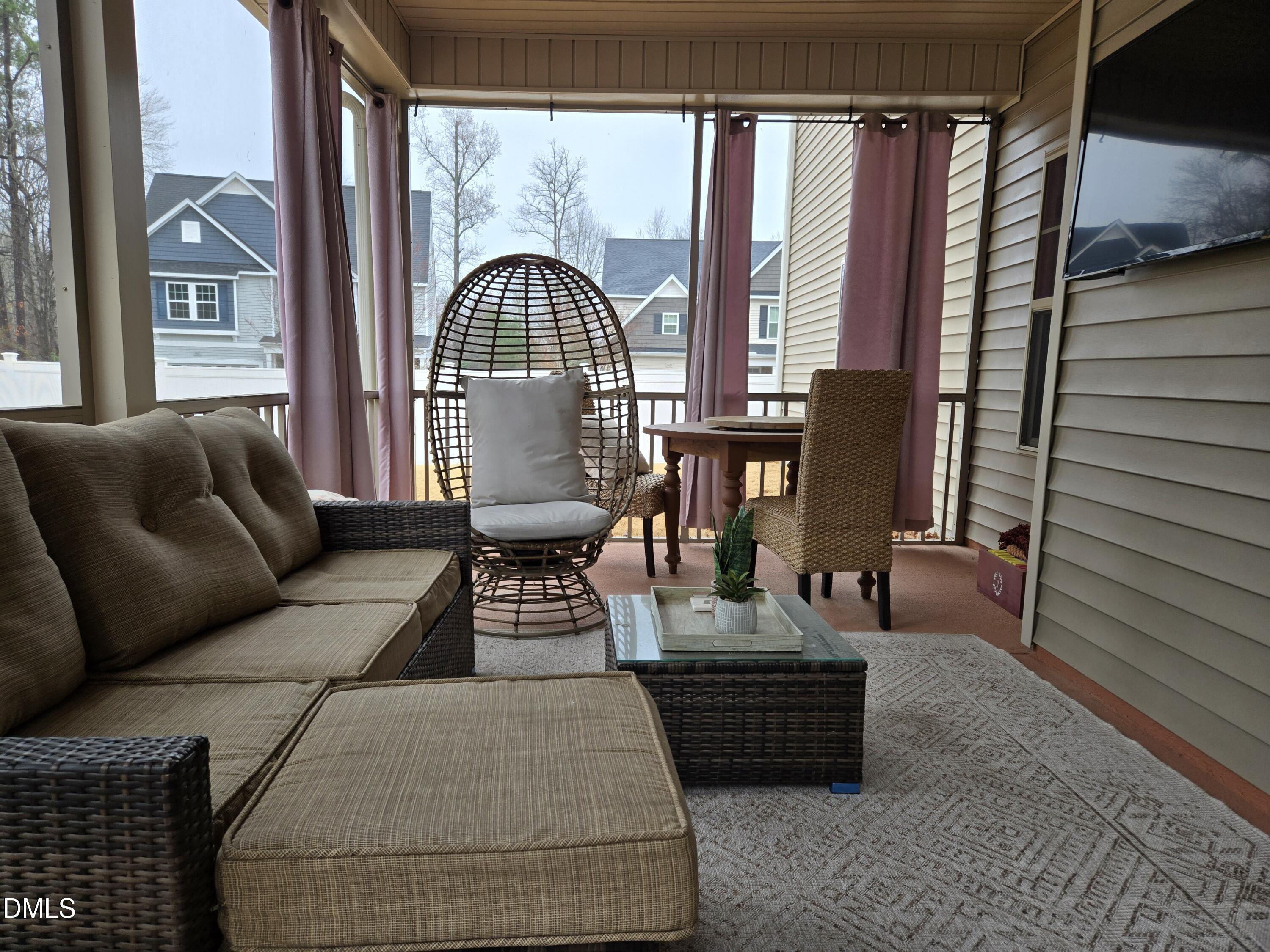 4202 Smithson Court Raleigh, NC 27616 - Photo 43 of 54 a living room with furniture and a window