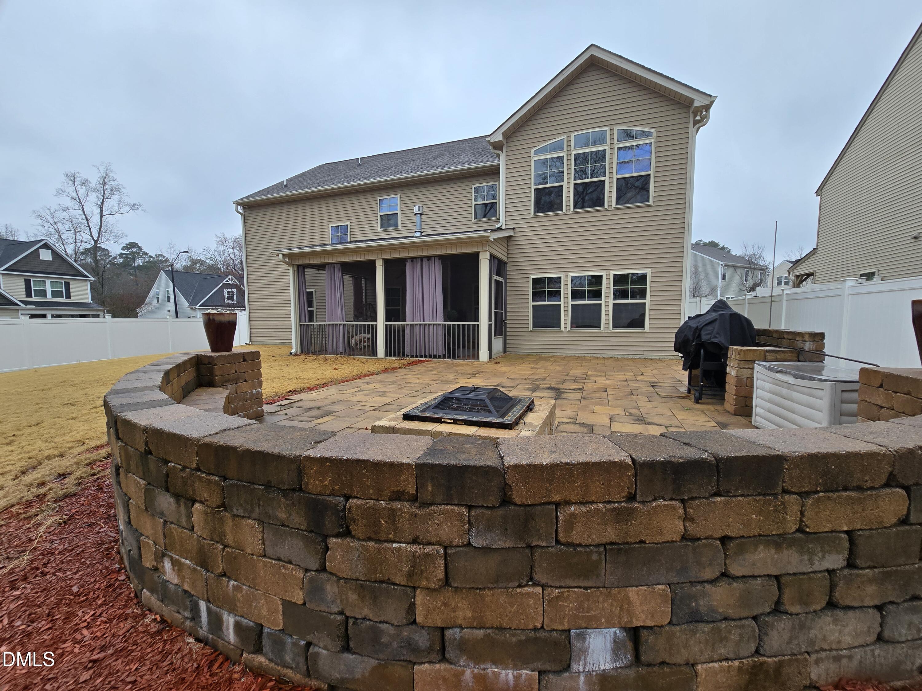 4202 Smithson Court Raleigh, NC 27616 - Photo 45 of 54 a bedroom with table and chairs