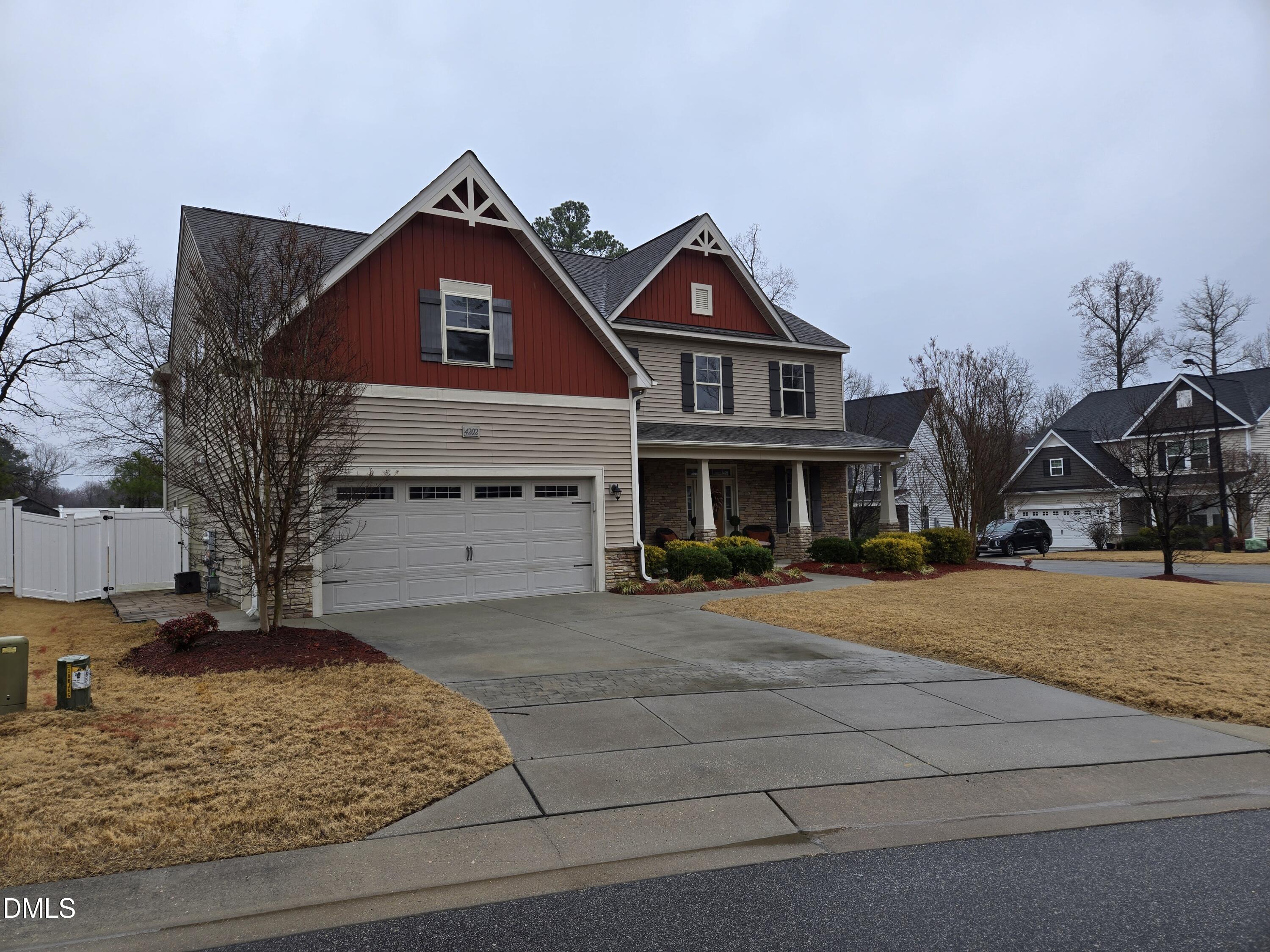 4202 Smithson Court Raleigh, NC 27616 - Photo 48 of 54 a front view of a house with yard