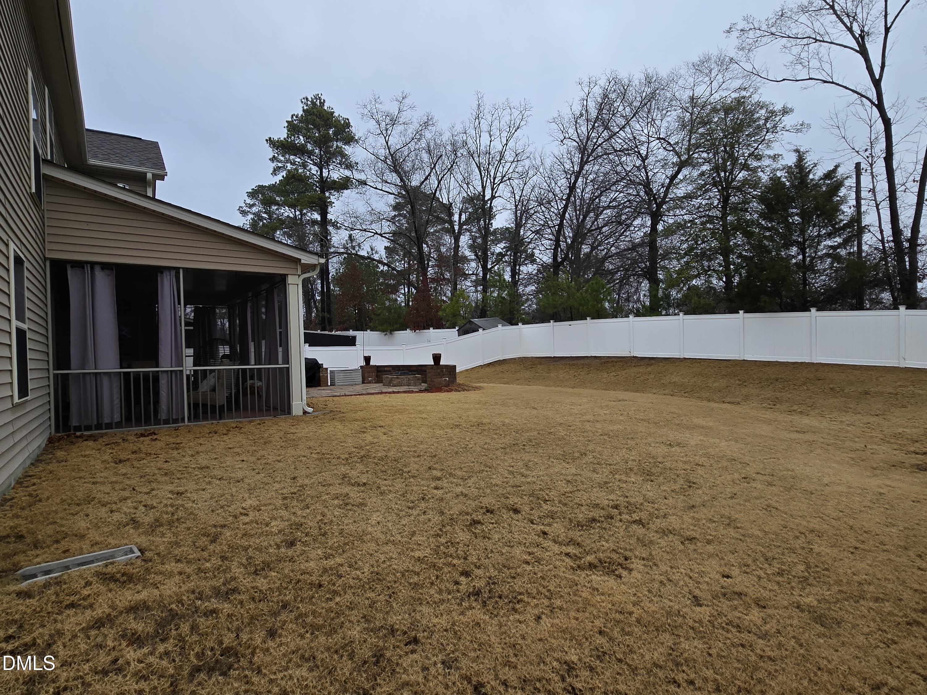 4202 Smithson Court Raleigh, NC 27616 - Photo 50 of 54 a view of a house with backyard and trees