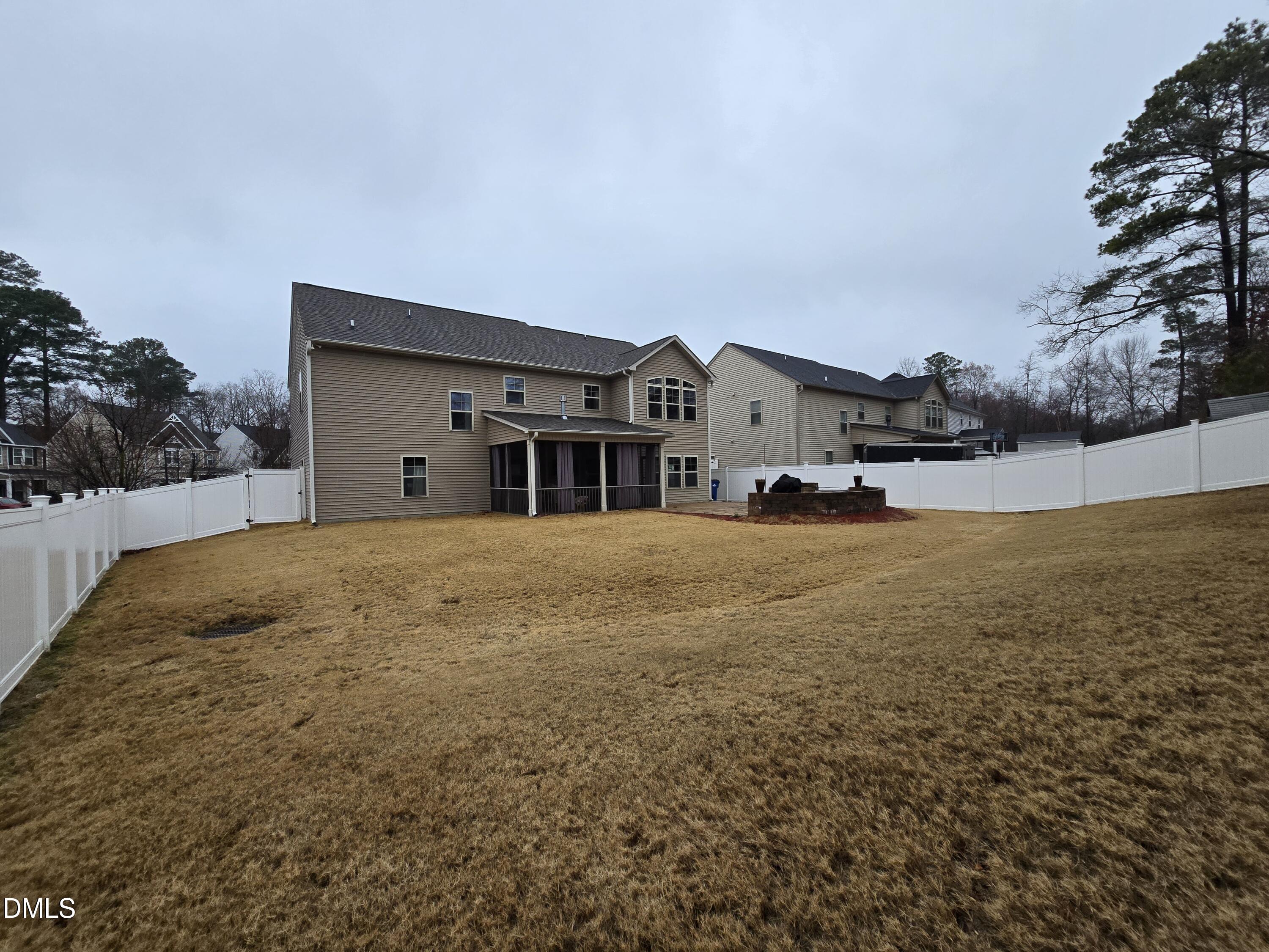 4202 Smithson Court Raleigh, NC 27616 - Photo 51 of 54 a view of a house with a yard