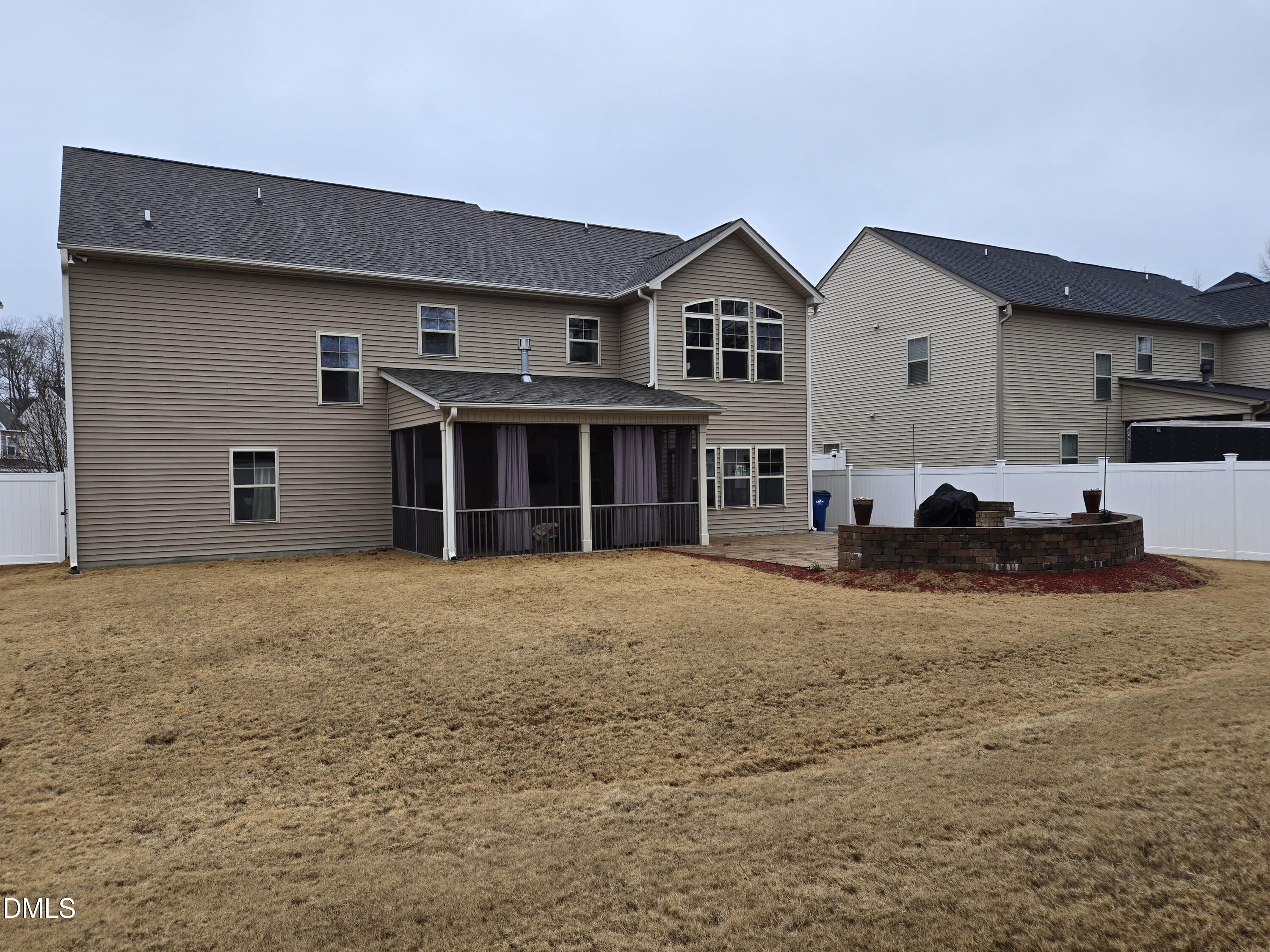 4202 Smithson Court Raleigh, NC 27616 - Photo 52 of 54 a view of a house with a yard and garage