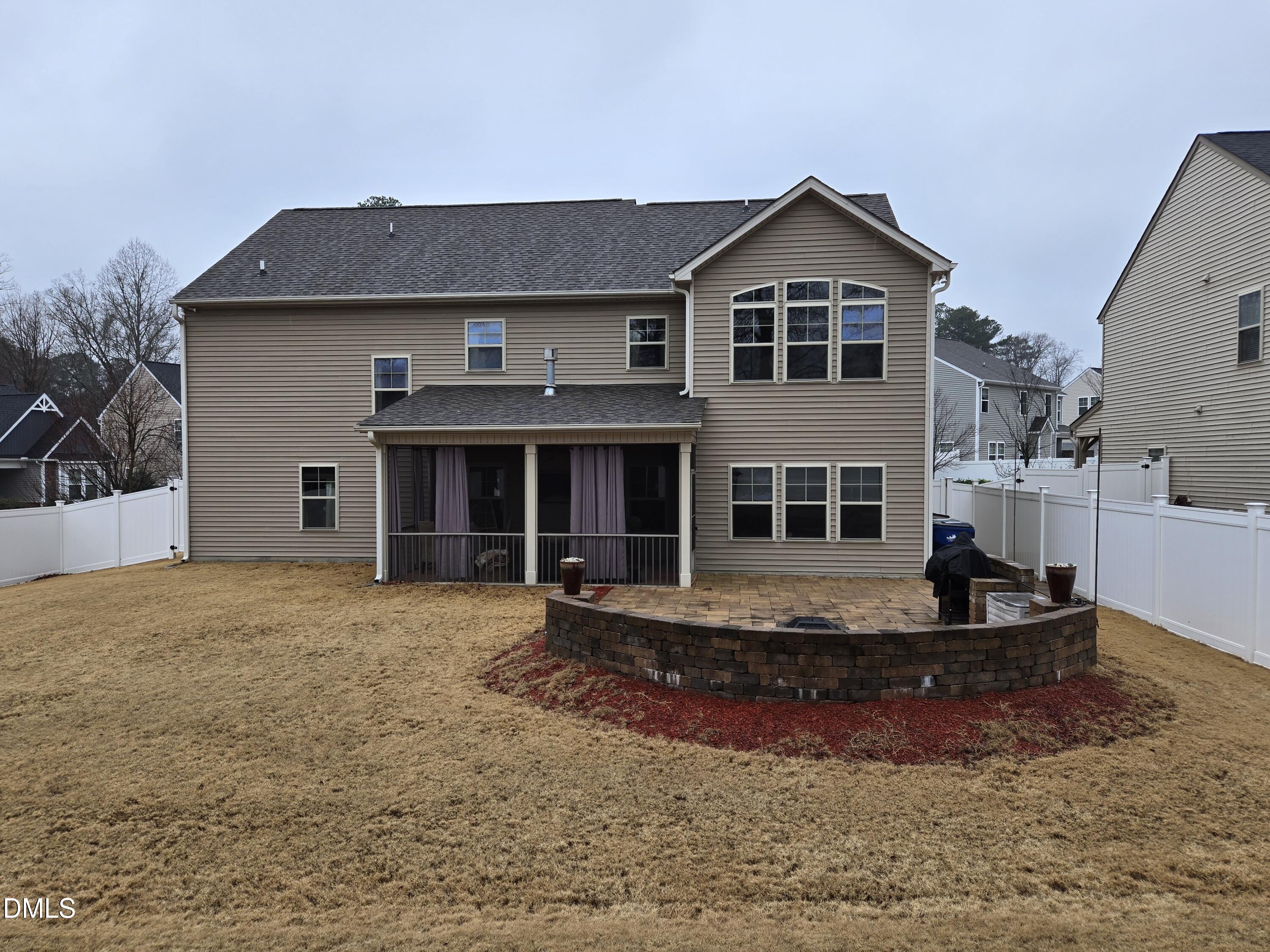 4202 Smithson Court Raleigh, NC 27616 - Photo 53 of 54 a front view of a house with a yard