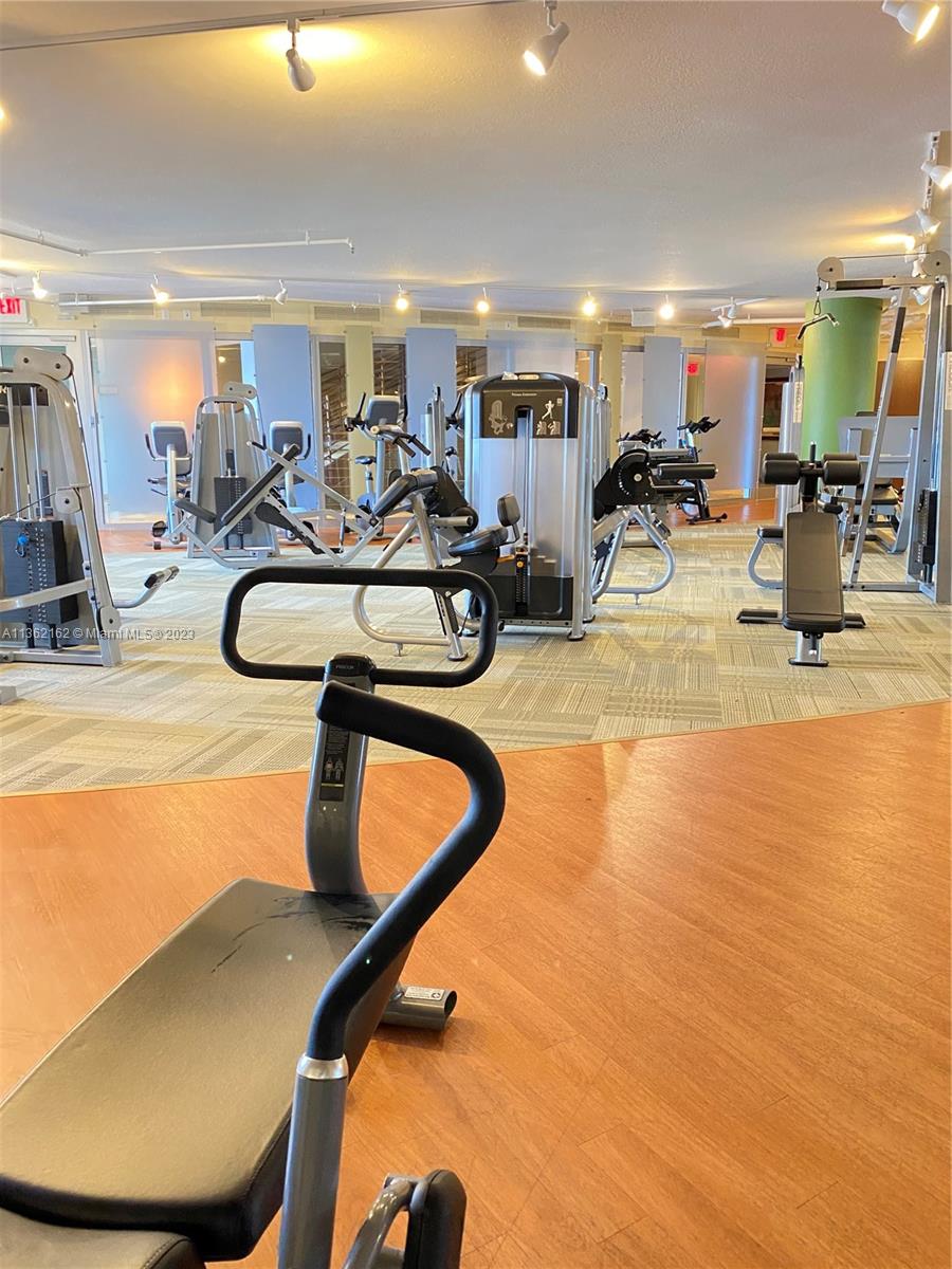 2681 North Flamingo Road, Unit 2408S Sunrise, FL 33323 - Photo 41 of 57 a view of a room with gym equipment