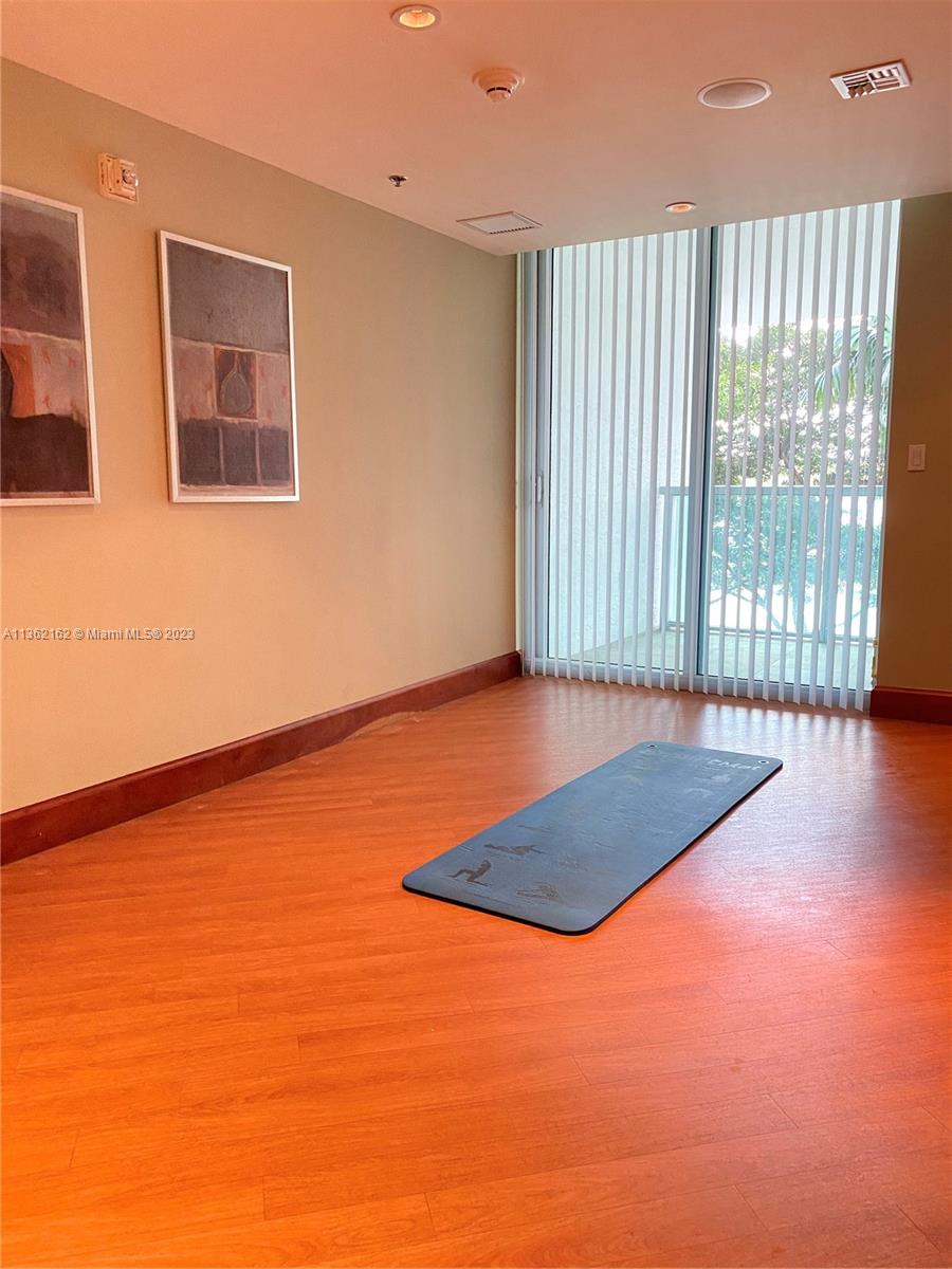 2681 North Flamingo Road, Unit 2408S Sunrise, FL 33323 - Photo 43 of 57 a view of an empty room with glass door