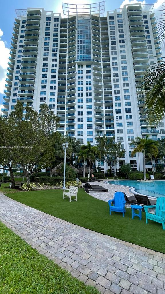 2681 North Flamingo Road, Unit 2408S Sunrise, FL 33323 - Photo 50 of 57 a aerial view of a building and yard with green space