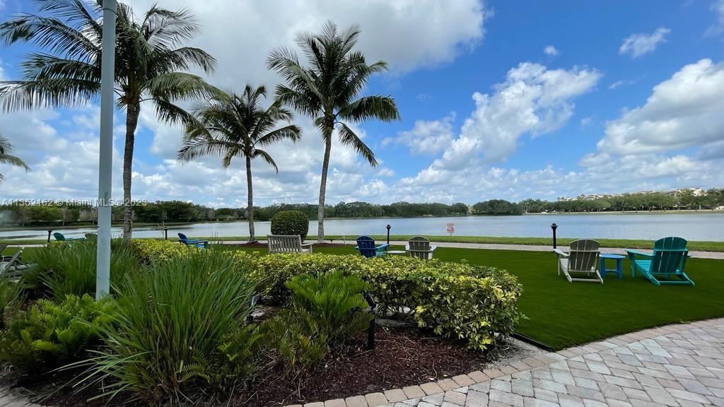 2681 North Flamingo Road, Unit 2408S Sunrise, FL 33323 - Photo 56 of 57 a view of a garden with a lake view