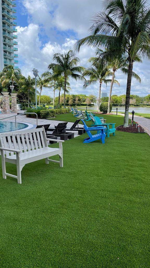 2681 North Flamingo Road, Unit 2408S Sunrise, FL 33323 - Photo 57 of 57 a view of a house with backyard and sitting area