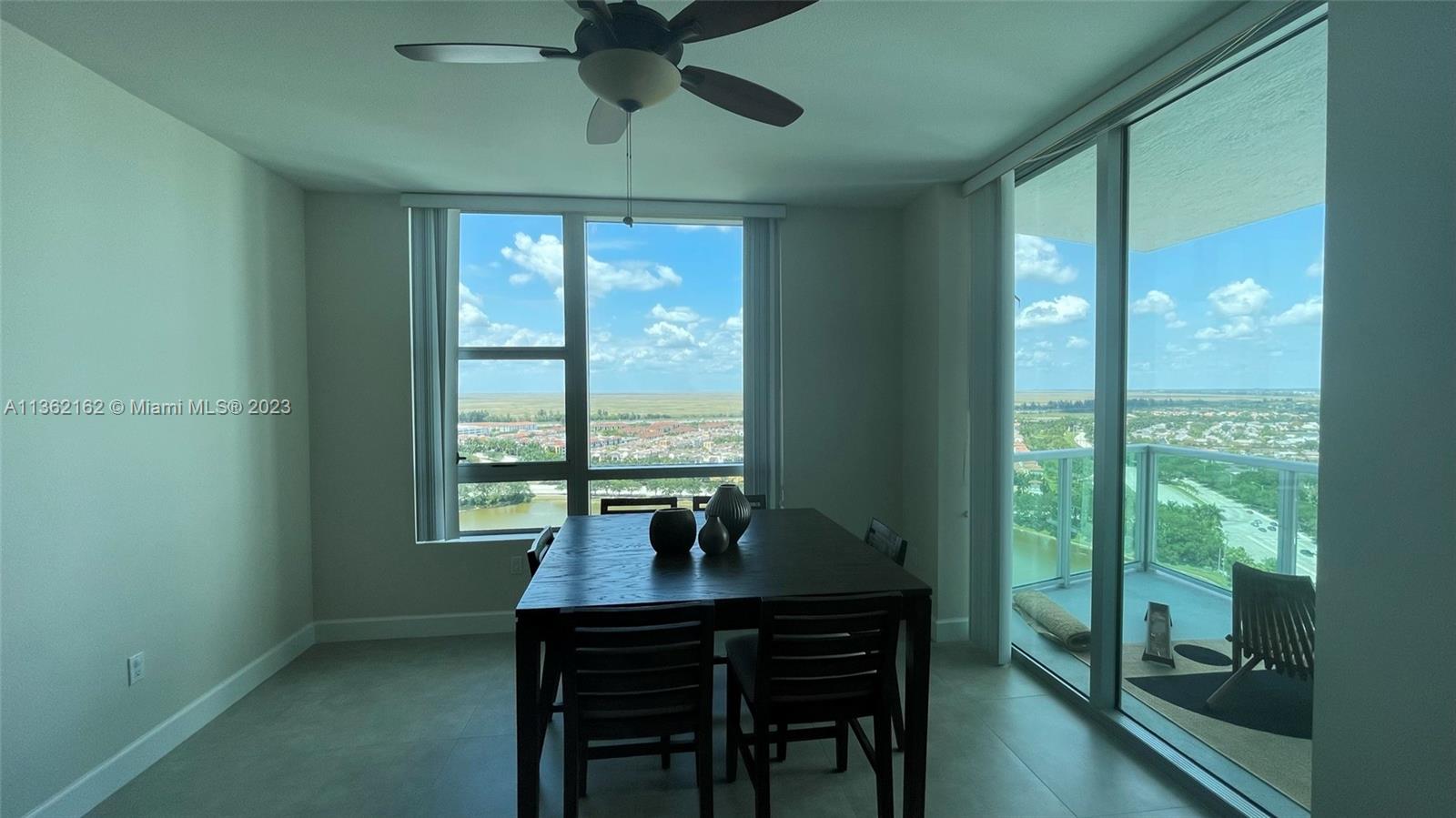 2681 North Flamingo Road, Unit 2408S Sunrise, FL 33323 - Photo 6 of 57 a view of a dining room with furniture window and outside view