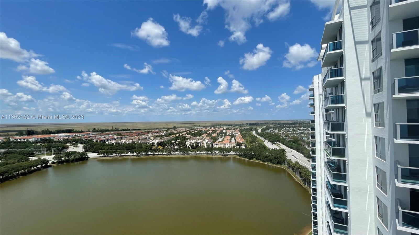 2681 North Flamingo Road, Unit 2408S Sunrise, FL 33323 - Photo 8 of 57 a view of a city and a lake view