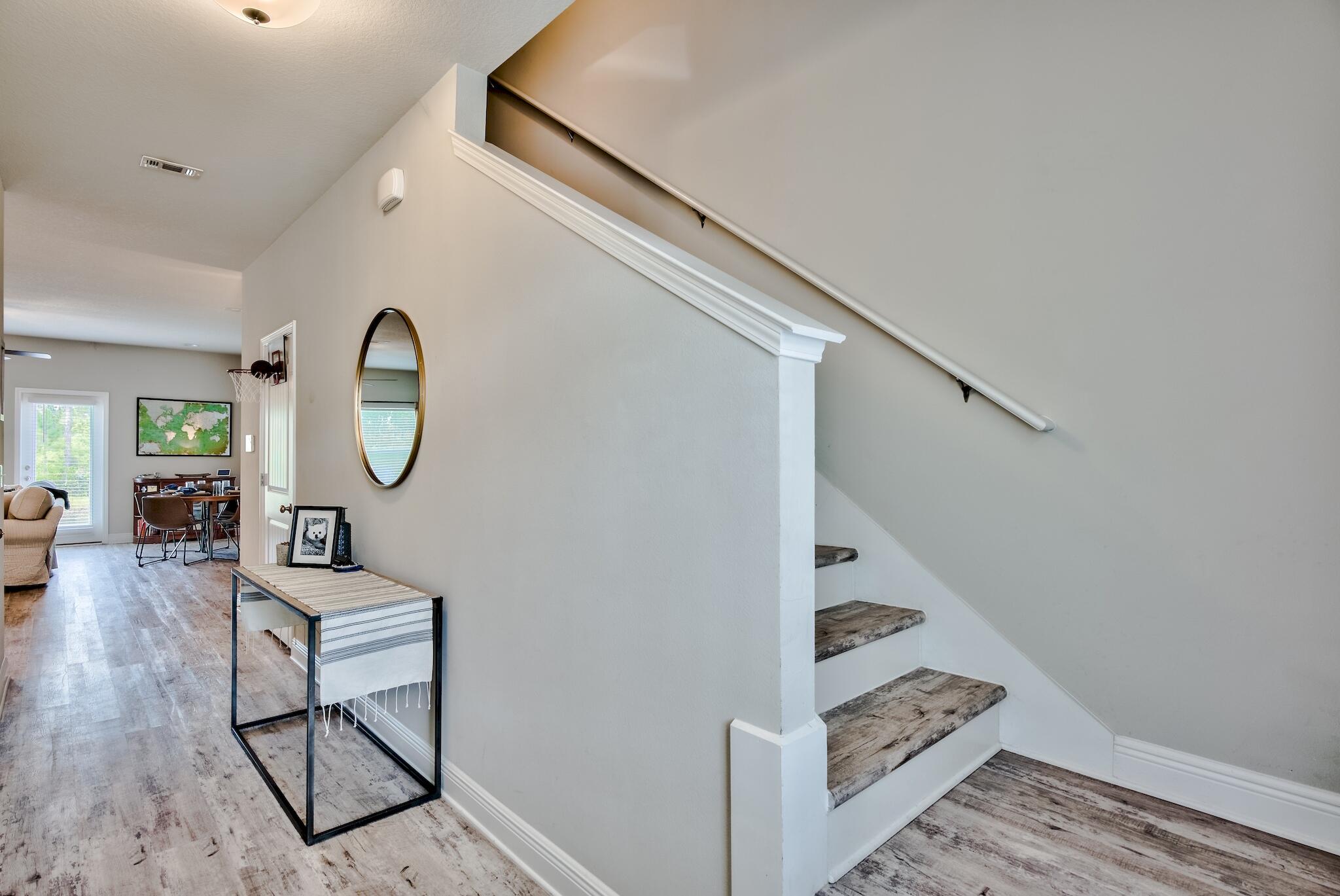 89 Crossing Lane, Unit C Santa Rosa Beach, FL 32459 - Photo 14 of 27 a living room with furniture and a window