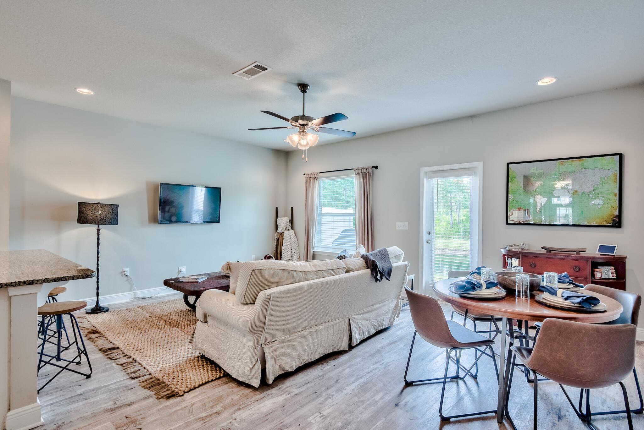 89 Crossing Lane, Unit C Santa Rosa Beach, FL 32459 - Photo 5 of 27 a living room with furniture and a large window