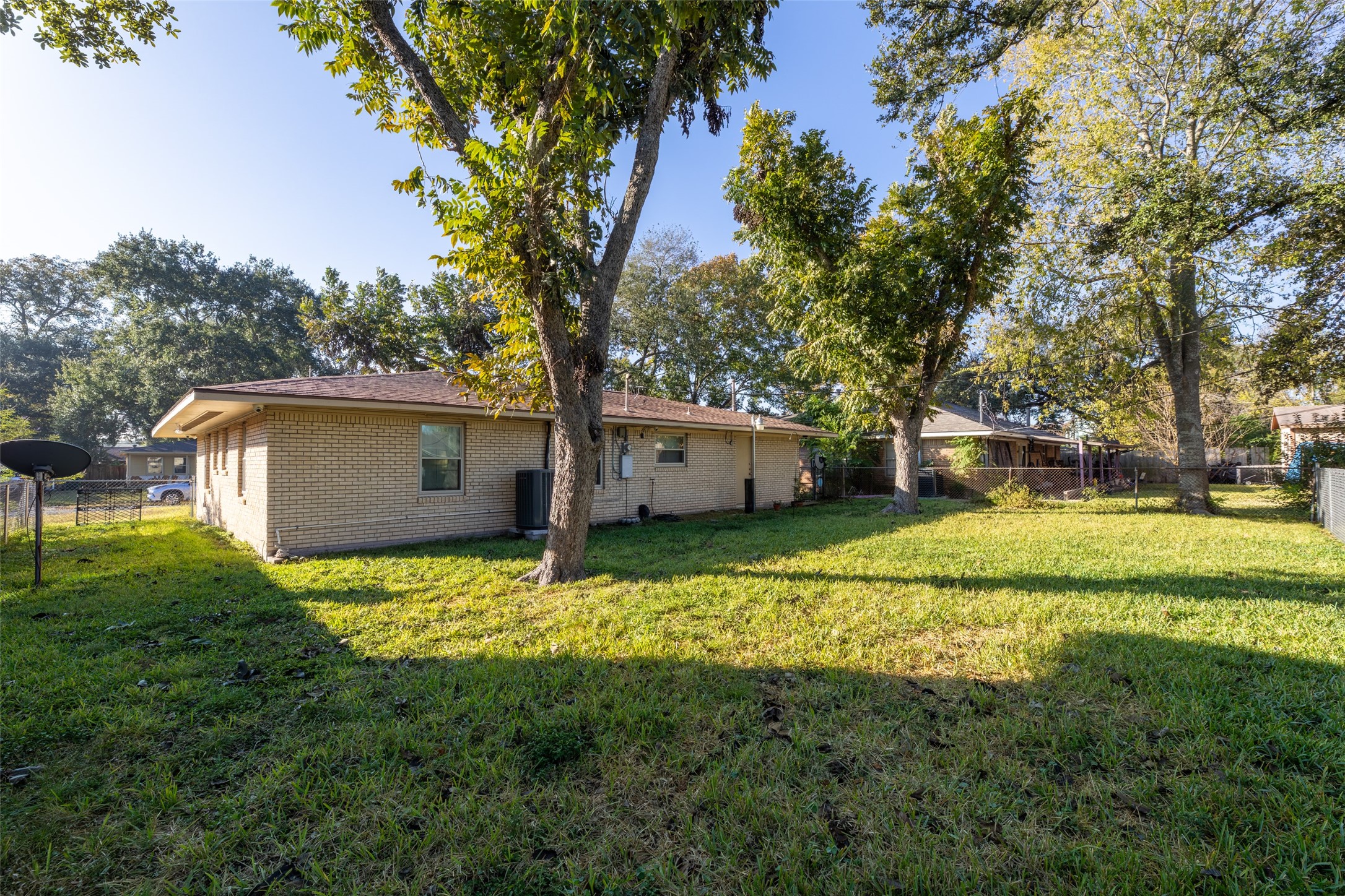 6834 Leader Street Houston, TX 77074 - Photo 20 of 20 a view of a house with a big yard