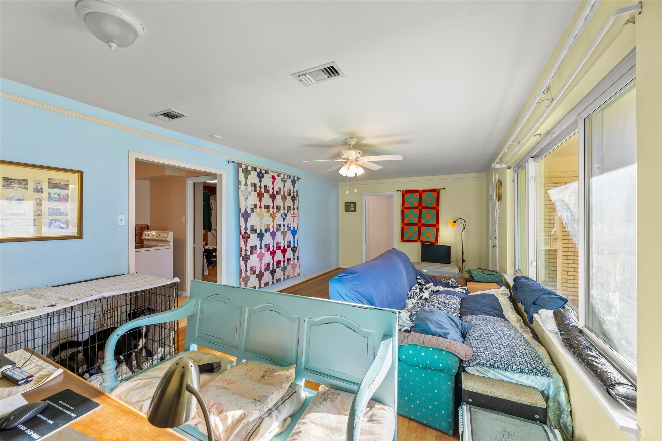 6834 Leader Street Houston, TX 77074 - Photo 4 of 20 a living room with furniture and a flat screen tv