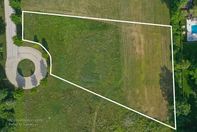 a bathroom with a shower and yard