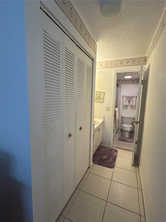 11485 Oakhurst Road, Unit 200318 Largo, FL 33774 - Photo 21 of 48 a bathroom with a glass door shower and a sink